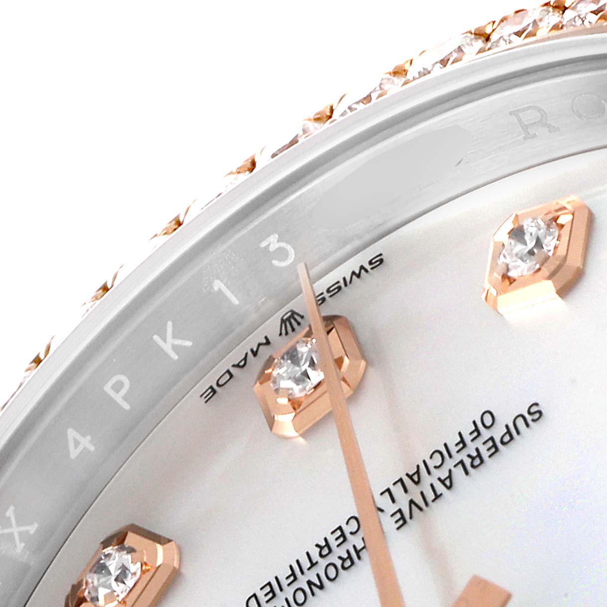 The image shows a close-up of the dial featuring diamond markers and the inscription on a Rolex Datejust 126281 Men's Steel and Gold (two tone) Mother of Pearl Dial 126281 Men's Steel and Gold (two tone) Mother of Pearl Dial watch.