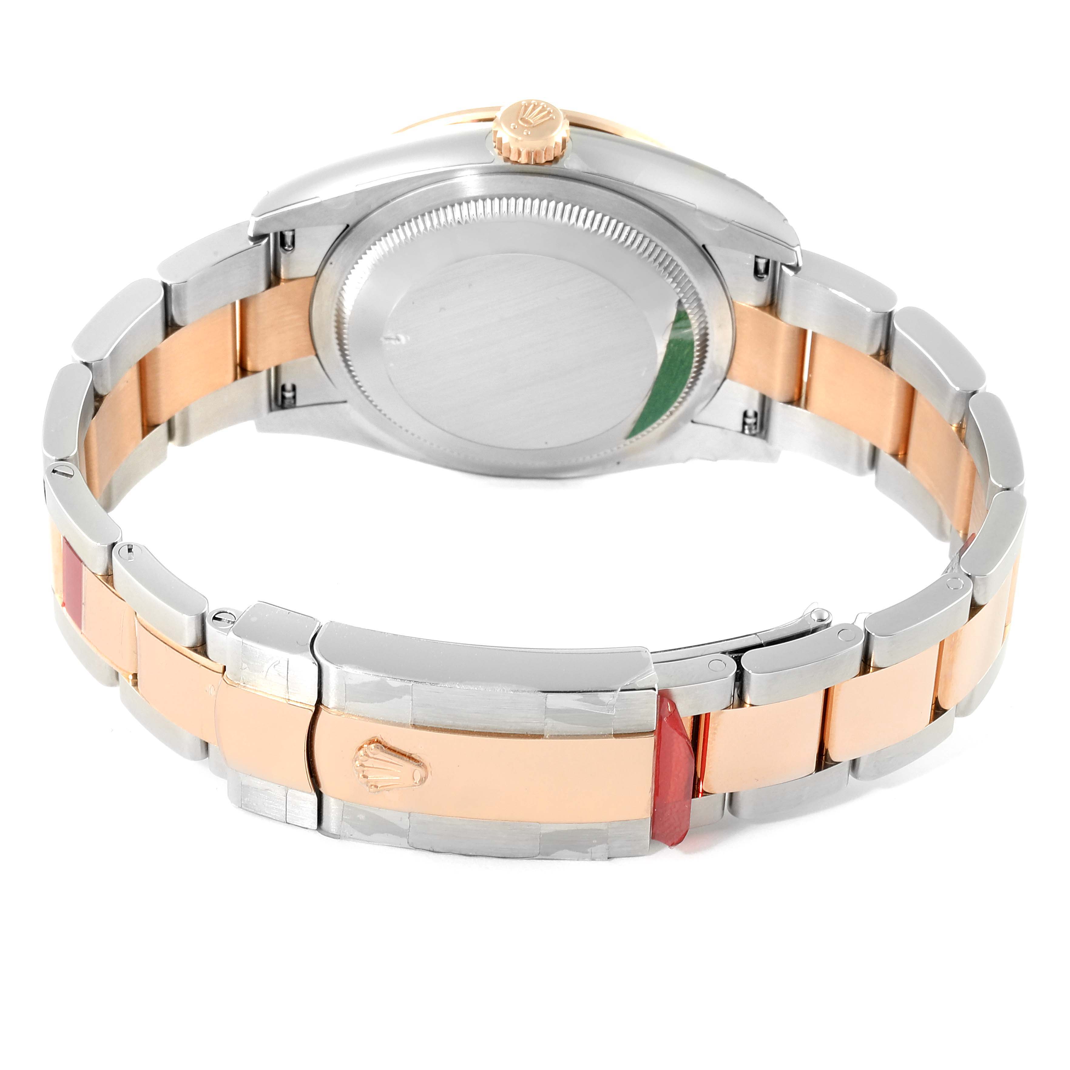 This image shows the back and clasp of a Rolex Datejust 126281 Men's Steel and Gold (two tone) Mother of Pearl Dial 126281 Men's Steel and Gold (two tone) Mother of Pearl Dial watch, highlighting its two-tone metal bracelet and case back.