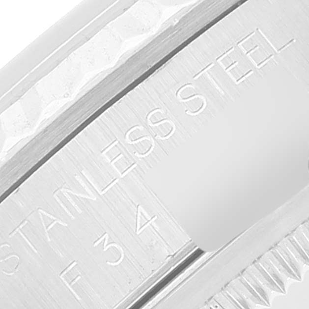 The image shows a close-up of the stainless steel marking on the Rolex Datejust 16234 Men's Stainless Steel Black Dial 16234 Men's Stainless Steel Black Dial watch case.