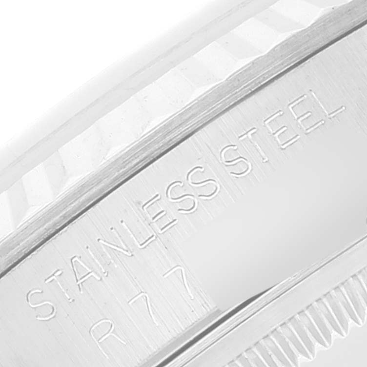 This image shows a close-up of the stainless steel case side of a Rolex Datejust 16234 Men's Stainless Steel Silver Dial 16234 Men's Stainless Steel Silver Dial watch, highlighting the engravings.