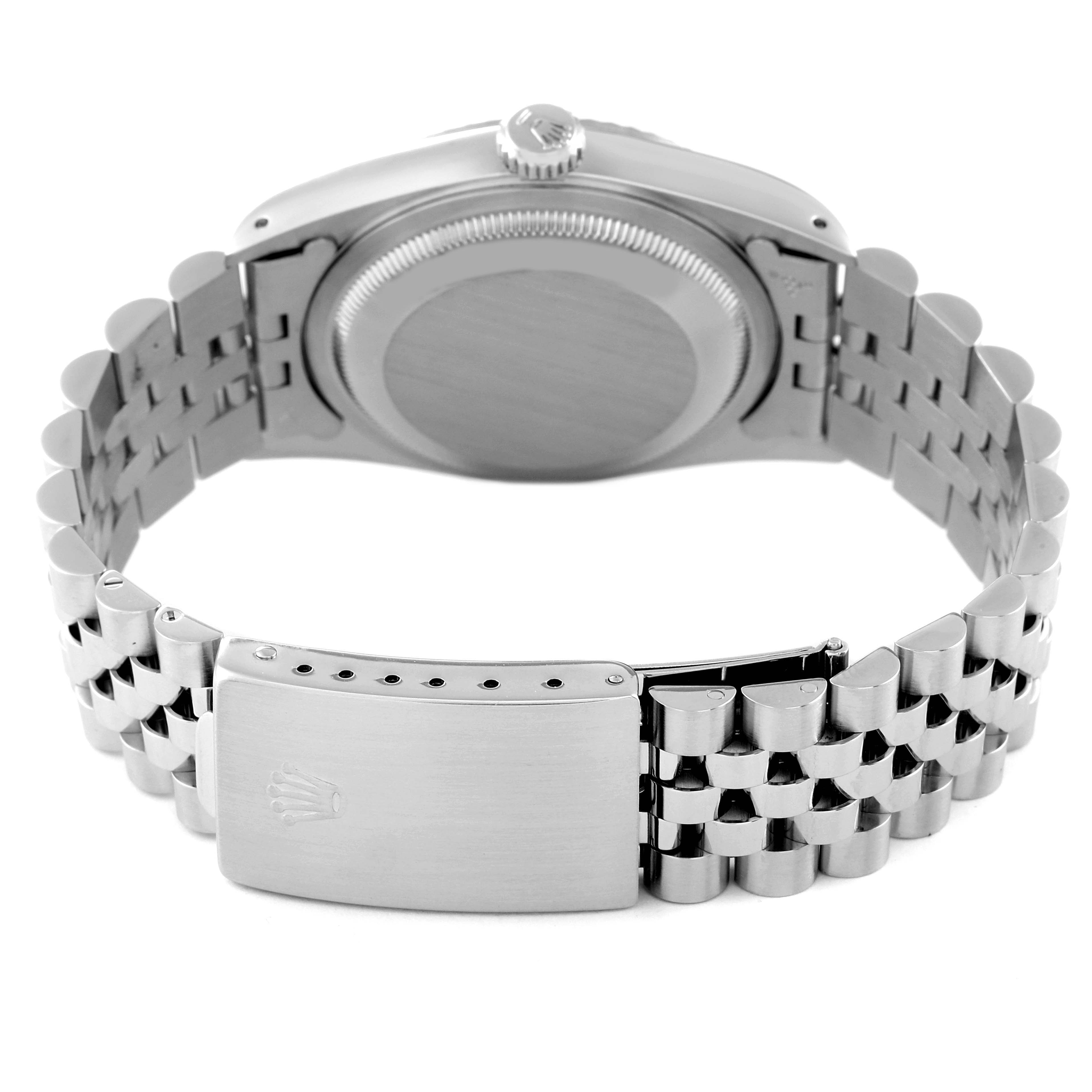 This is a rear view of the Rolex Datejust 16234 Men's Stainless Steel Silver Dial 16234 Men's Stainless Steel Silver Dial watch, showing the case back, crown, and bracelet with clasp.