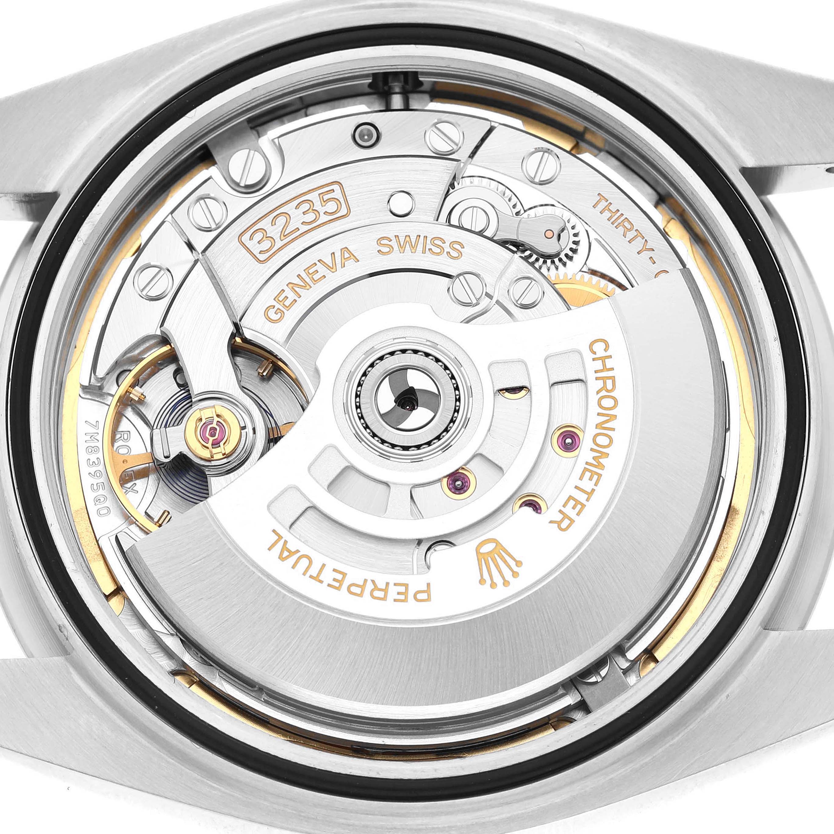 This image shows the movement of a Rolex Datejust 41 126334 Men's Stainless Steel Green Dial, highlighting its internal mechanical parts from a rear angle.