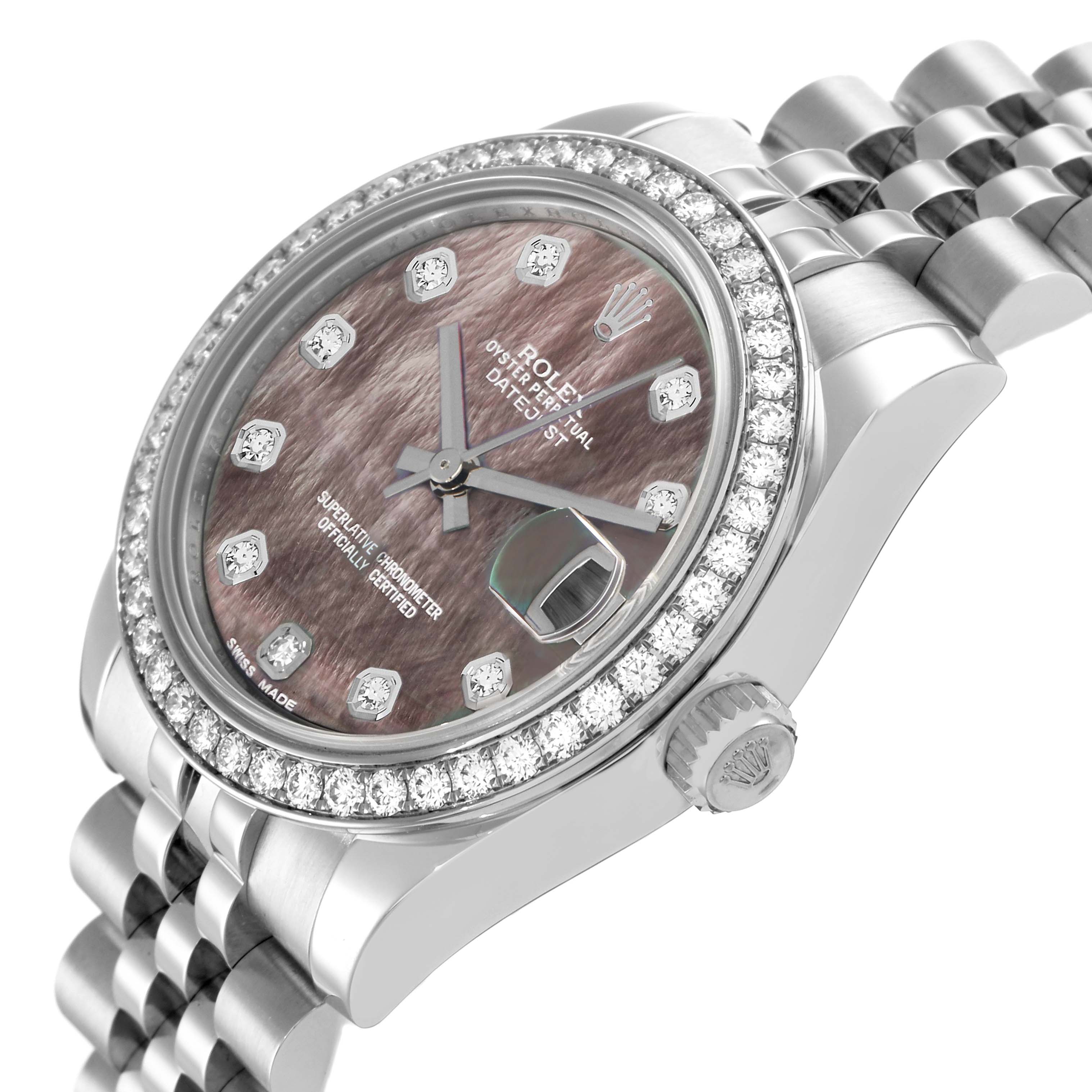 The Rolex Datejust 178384 Women
s Stainless Steel Mother of Pearl Dial watch is shown at an angled side view, highlighting the bezel, crown, dial, and a portion of the bracelet.
