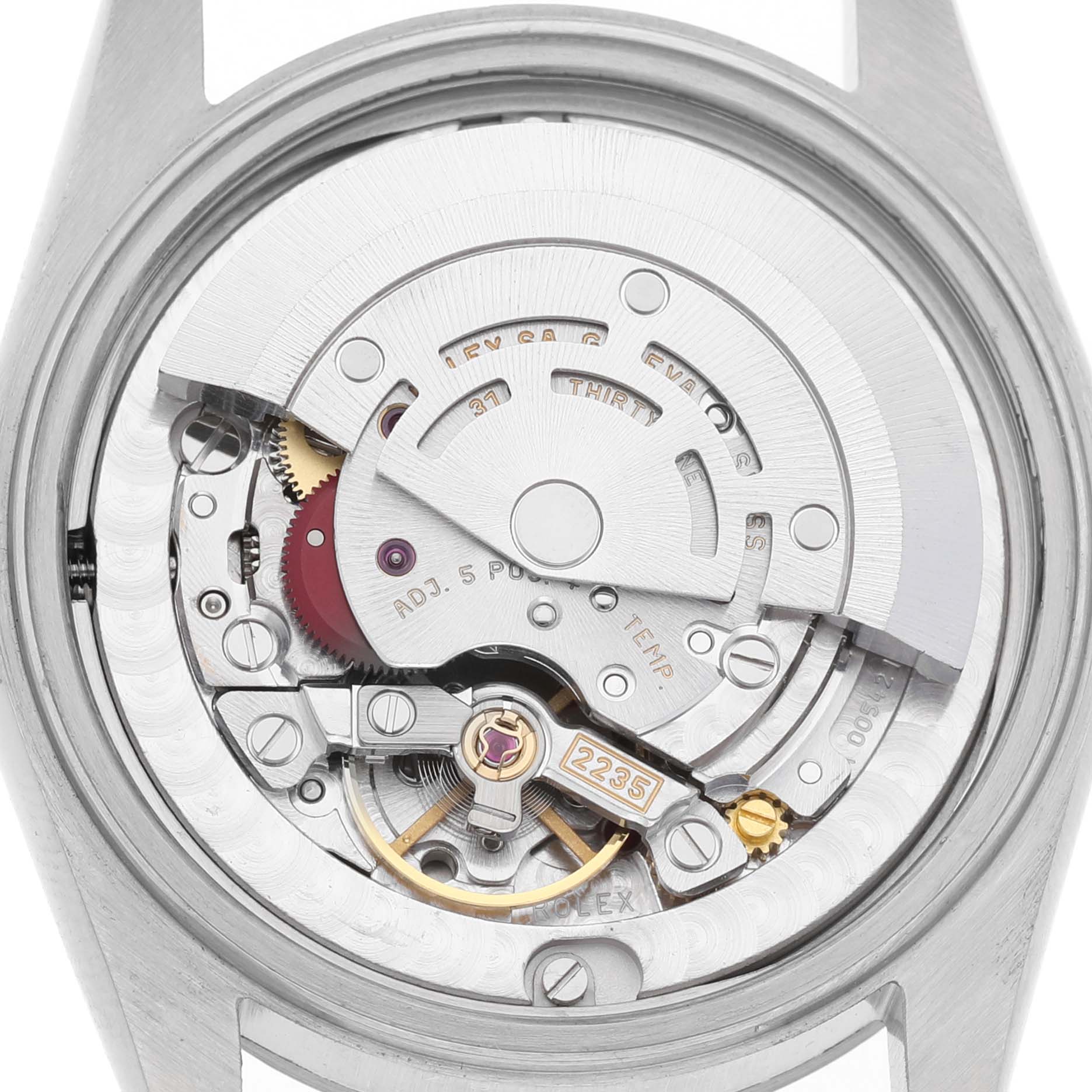 The image shows the internal mechanism (movement) of a Mid-Size Rolex watch from the back.