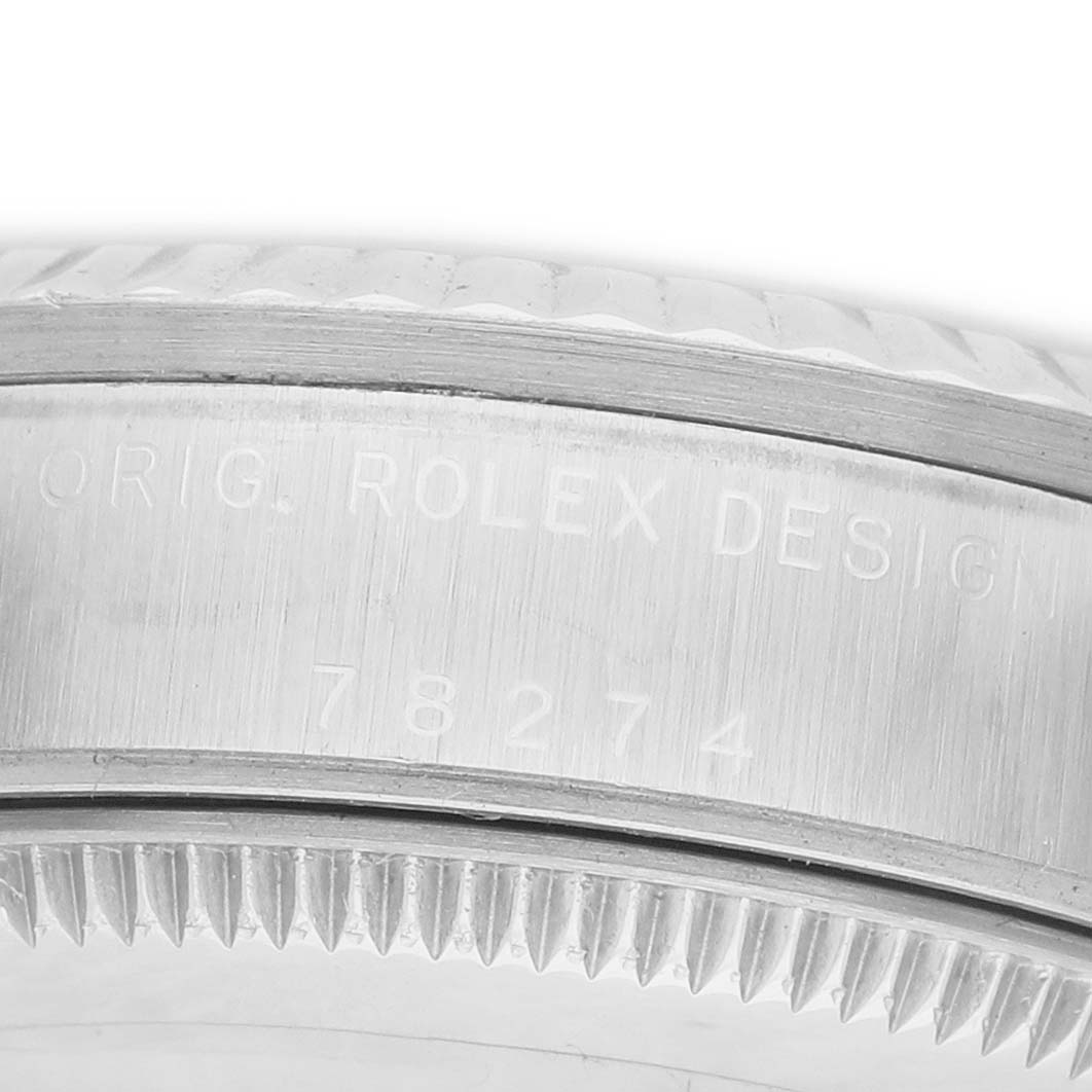 The image shows a close-up of the side of a Rolex Mid-Size 178274 Women's Stainless Steel White Dial watch, highlighting the design and model number 78274 engraving.