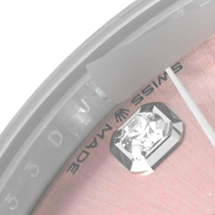 This close-up of the Rolex Datejust 278344 Women's Stainless Steel Pink Dial 278344 Women's Stainless Steel Pink Dial shows the dial with a diamond hour marker and the "Swiss Made" text.