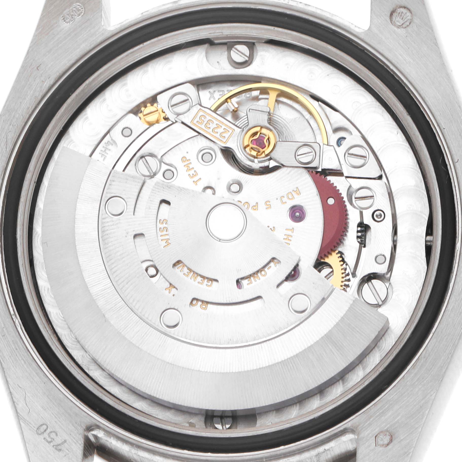 The image shows the movement of a Rolex President 178159 Women
s White Gold Mother of Pearl Dial model watch from the back, highlighting its mechanical components.