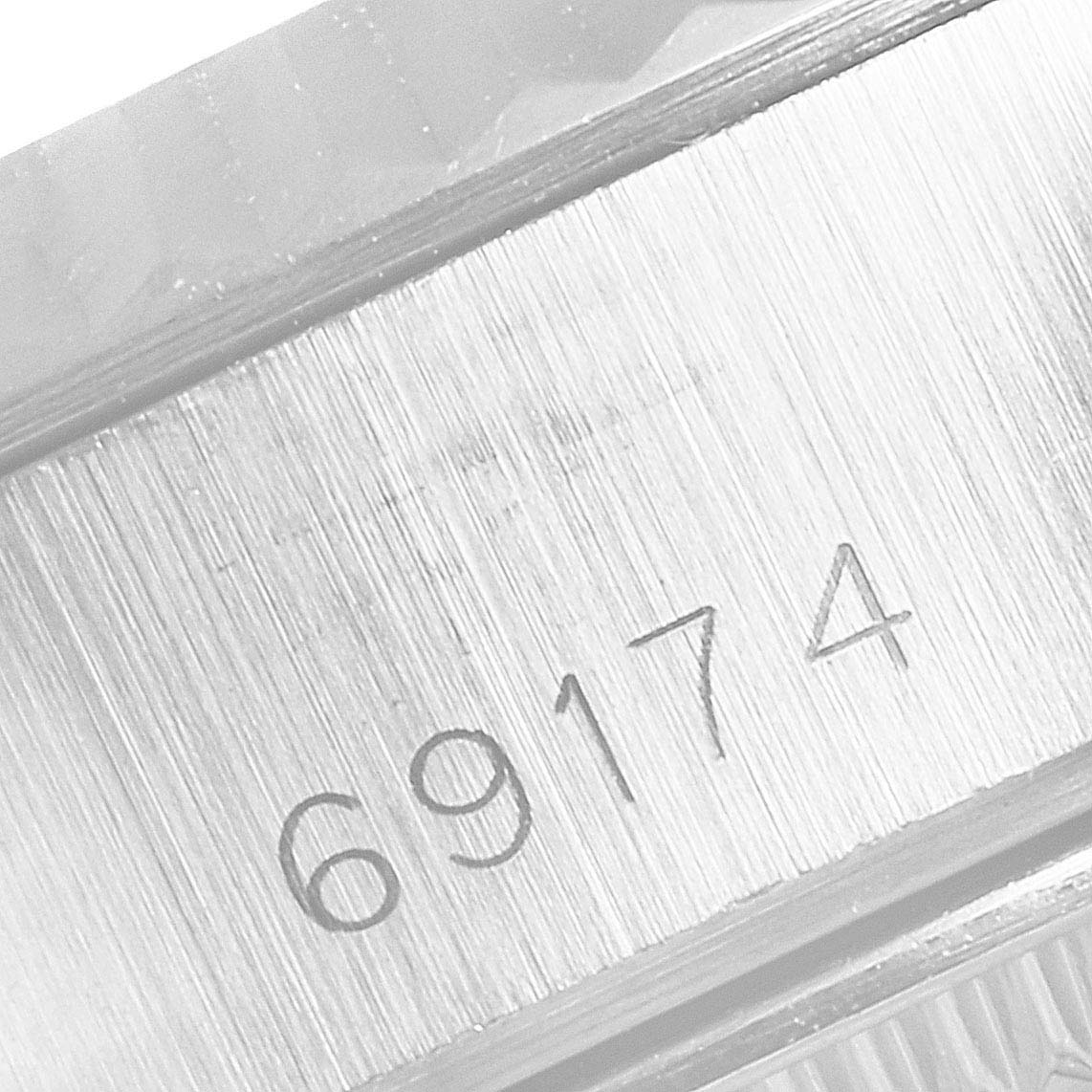 This image shows a close-up of the model number "69174" on a Rolex Datejust 69174 Women
s Stainless Steel Silver Dial 69174 Women
s Stainless Steel Silver Dial watch.