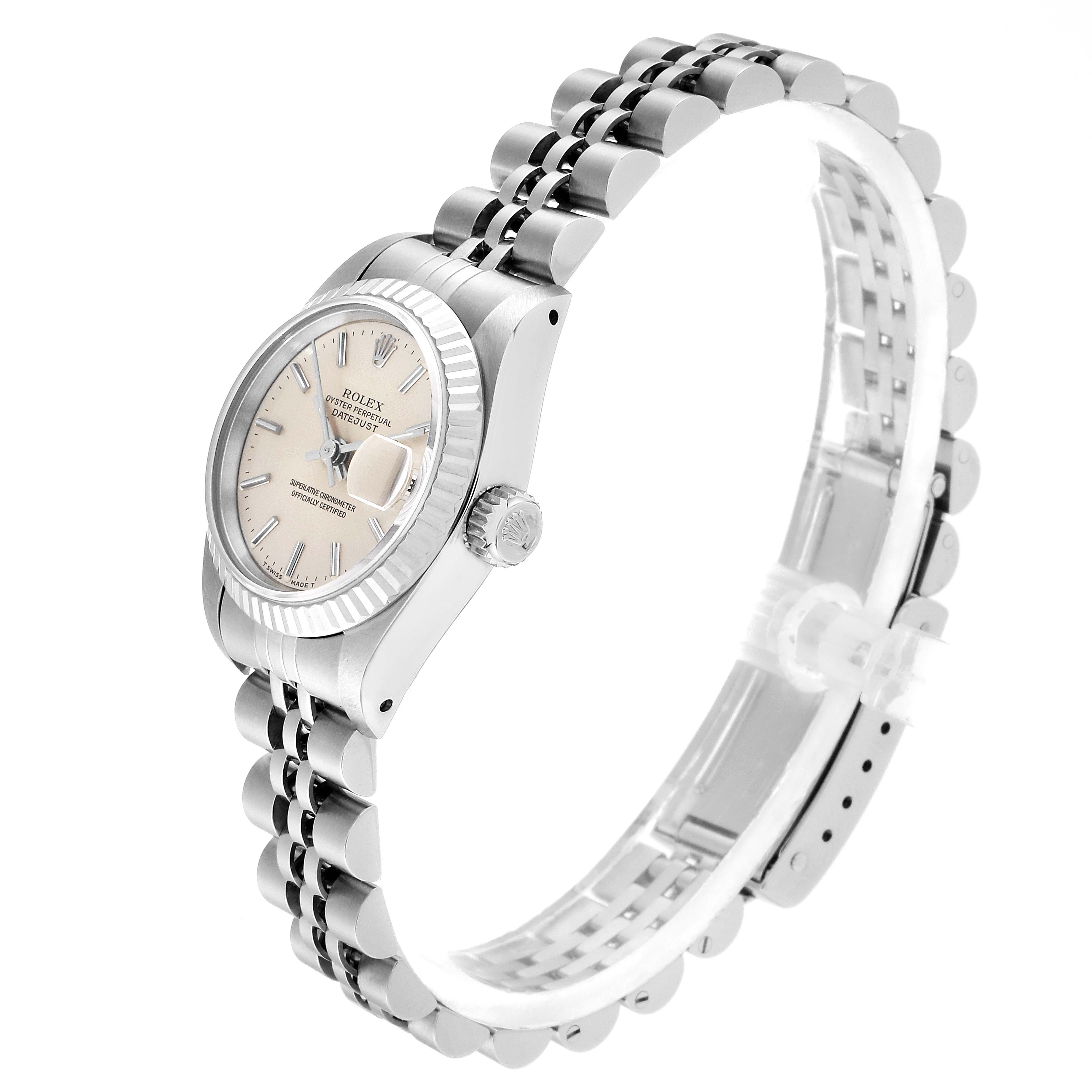 This Rolex Datejust 69174 Women
s Stainless Steel Silver Dial 69174 Women
s Stainless Steel Silver Dial watch is shown from a slightly angled side view, displaying the face, bezel, crown, and bracelet.