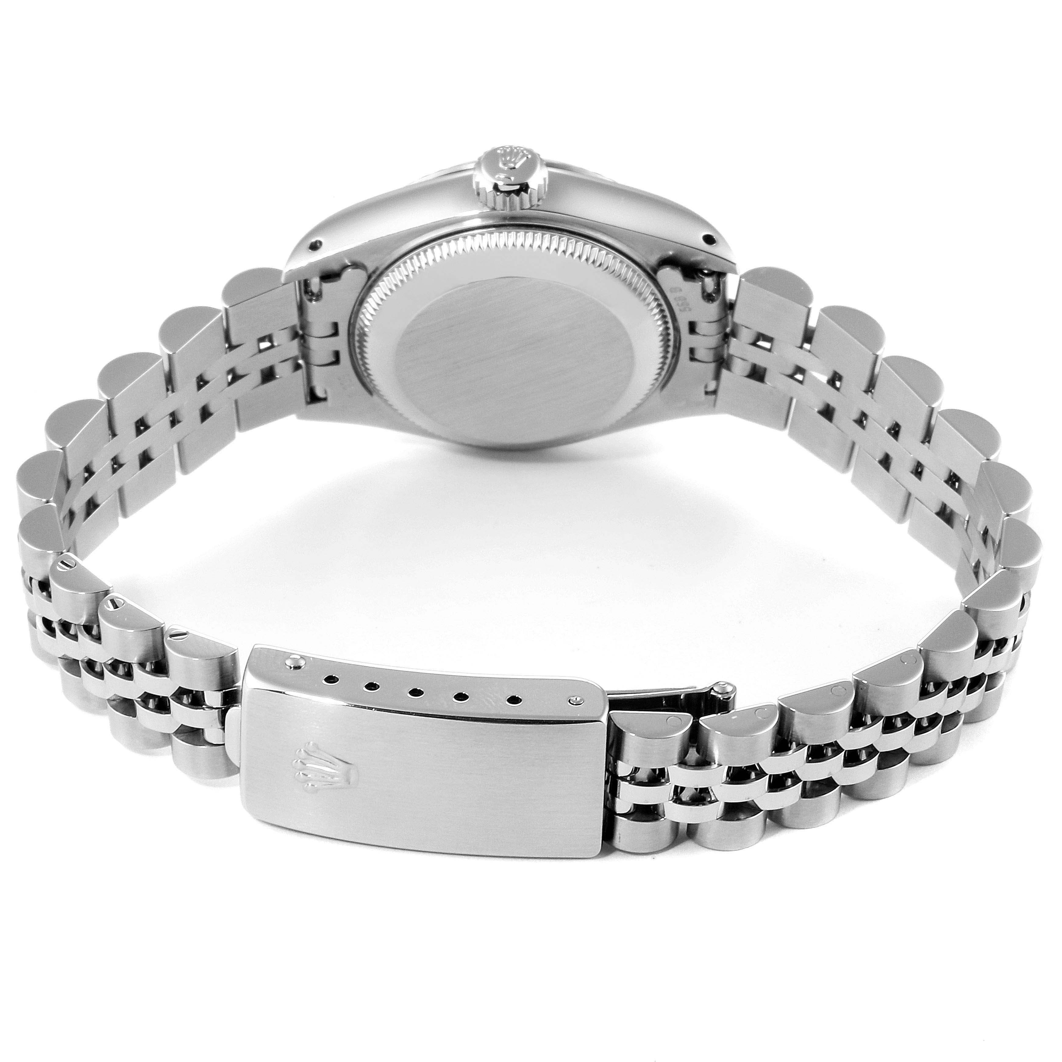 This image shows the back view of the Rolex Datejust 69174 Women
s Stainless Steel Silver Dial 69174 Women
s Stainless Steel Silver Dial watch, highlighting its case back, crown, and bracelet clasp.