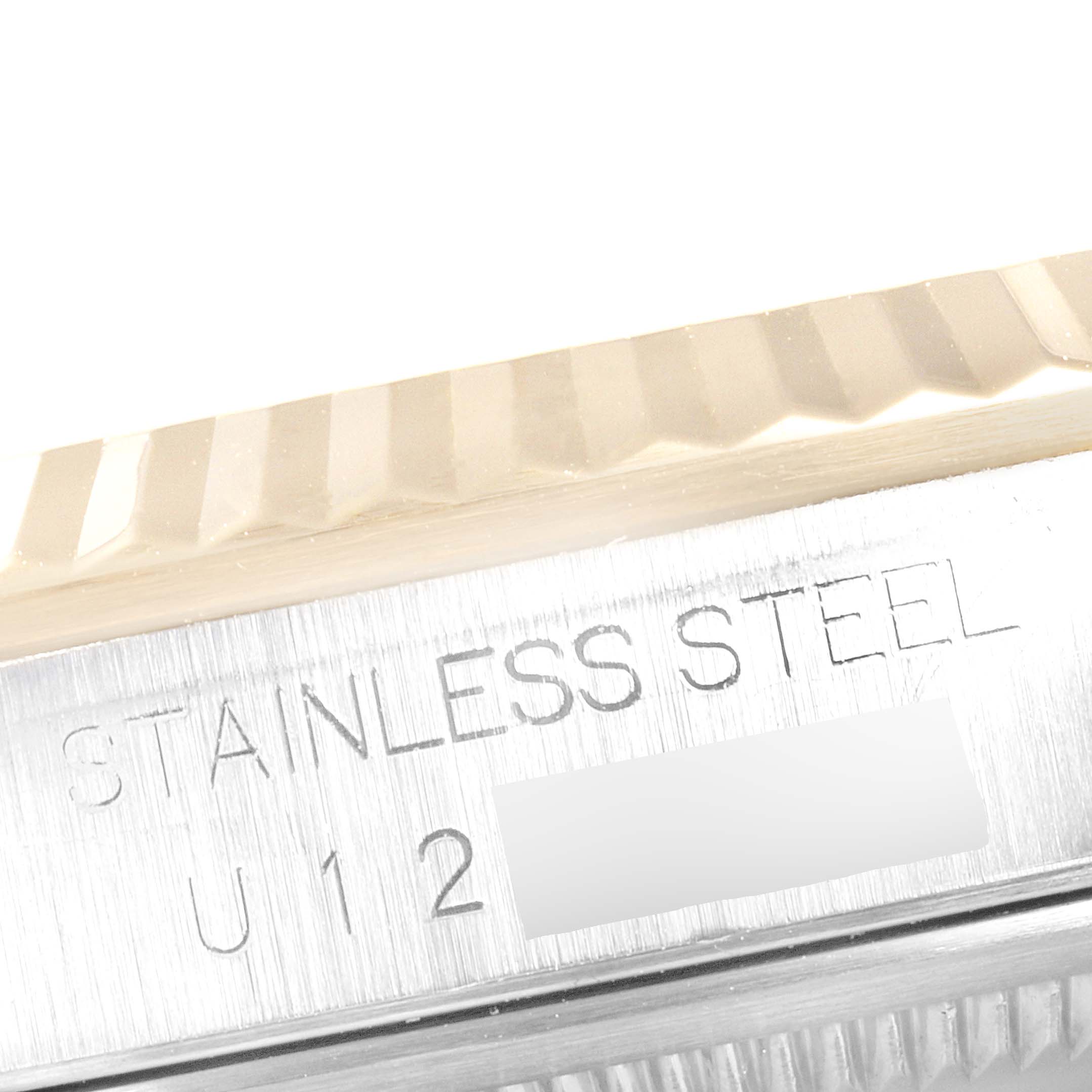 This close-up angle shows the fluted bezel and part of the stainless steel casing of the Rolex Datejust 16233 Men
s Steel and Gold (two tone) Silver Dial 16233 Men
s Steel and Gold (two tone) Silver Dial.