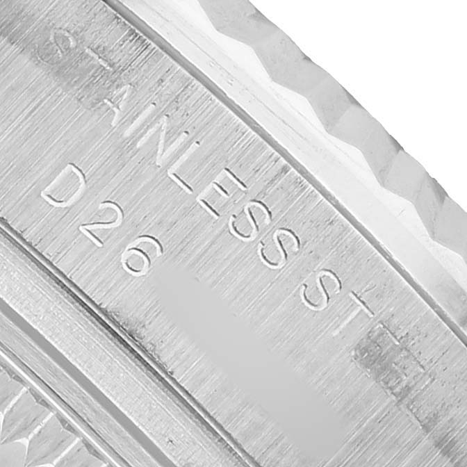 The image shows a close-up of the inner engraving on a Rolex Datejust 179174 Women's Stainless Steel Black Dial bezel with stainless steel markings.