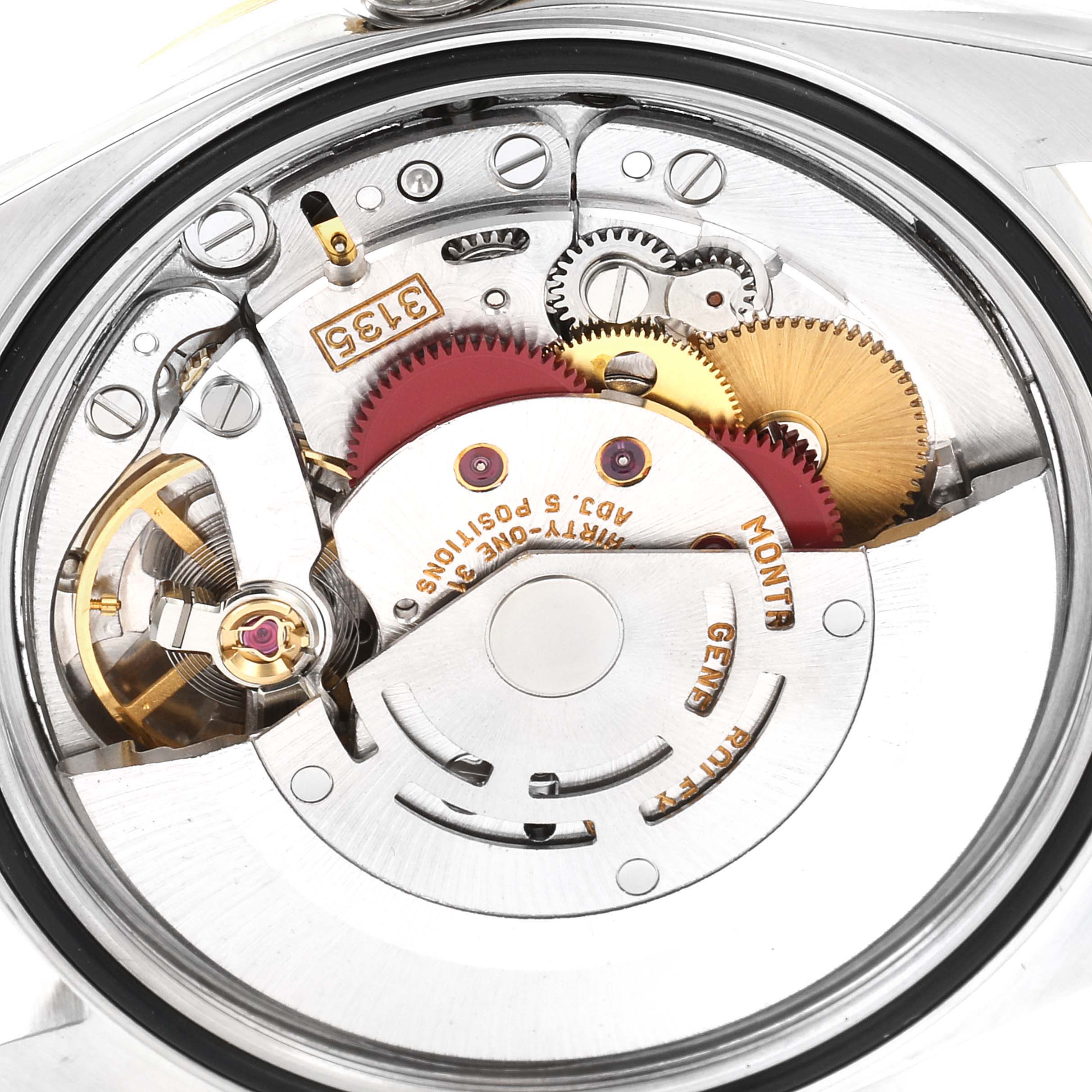 This image shows the movement and internal mechanism of a Rolex Datejust 16233 Men's Steel and Gold (two tone) Champagne Dial 16233 Men's Steel and Gold (two tone) Champagne Dial watch from the back.