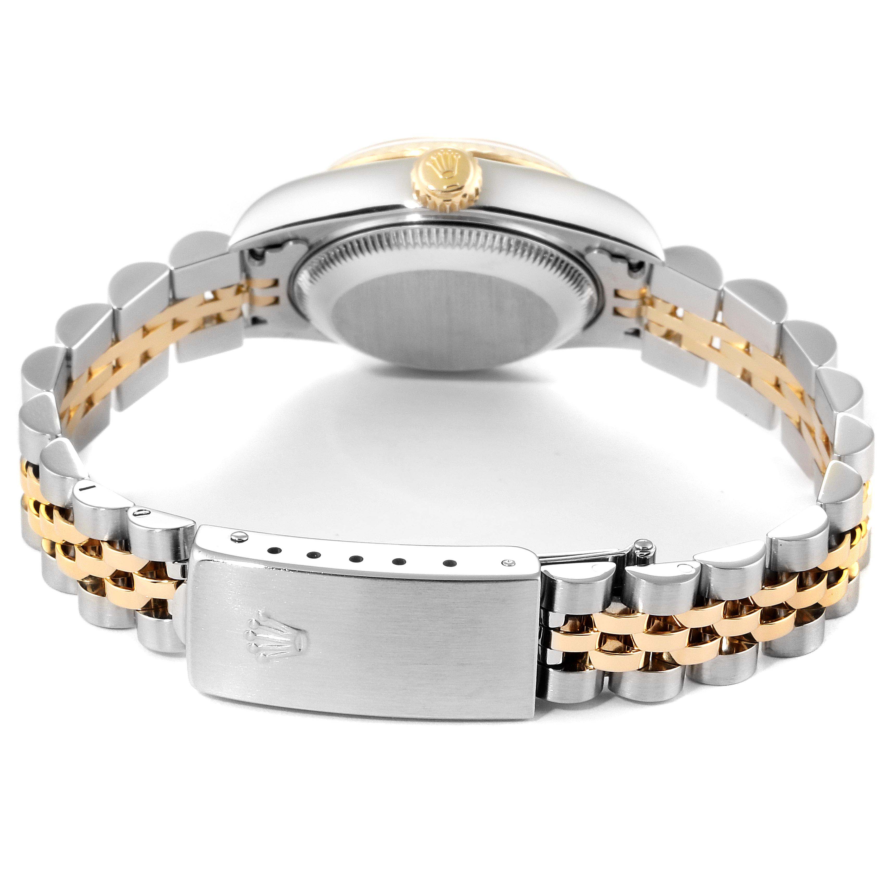 The image shows the back view of a Rolex Datejust 79173 Women's Steel and Gold (two tone) Champagne Dial 79173 Women's Steel and Gold (two tone) Champagne Dial watch, focusing on the clasp, bracelet, and case back.