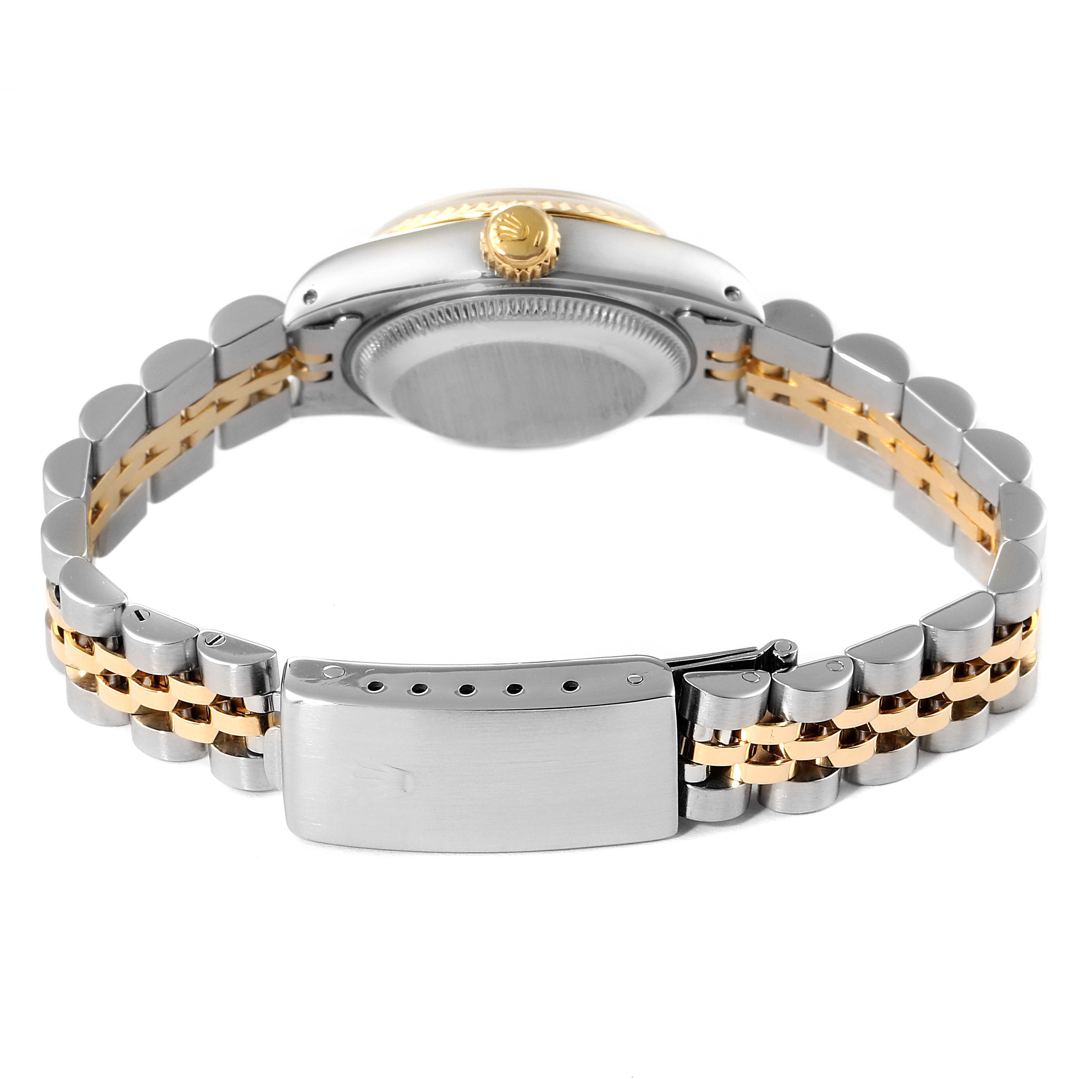 The image shows the back view of a Rolex Datejust 69173 Women
s Steel and Gold (two tone) Silver Dial 69173 Women
s Steel and Gold (two tone) Silver Dial watch, highlighting the clasp and part of the bracelet.