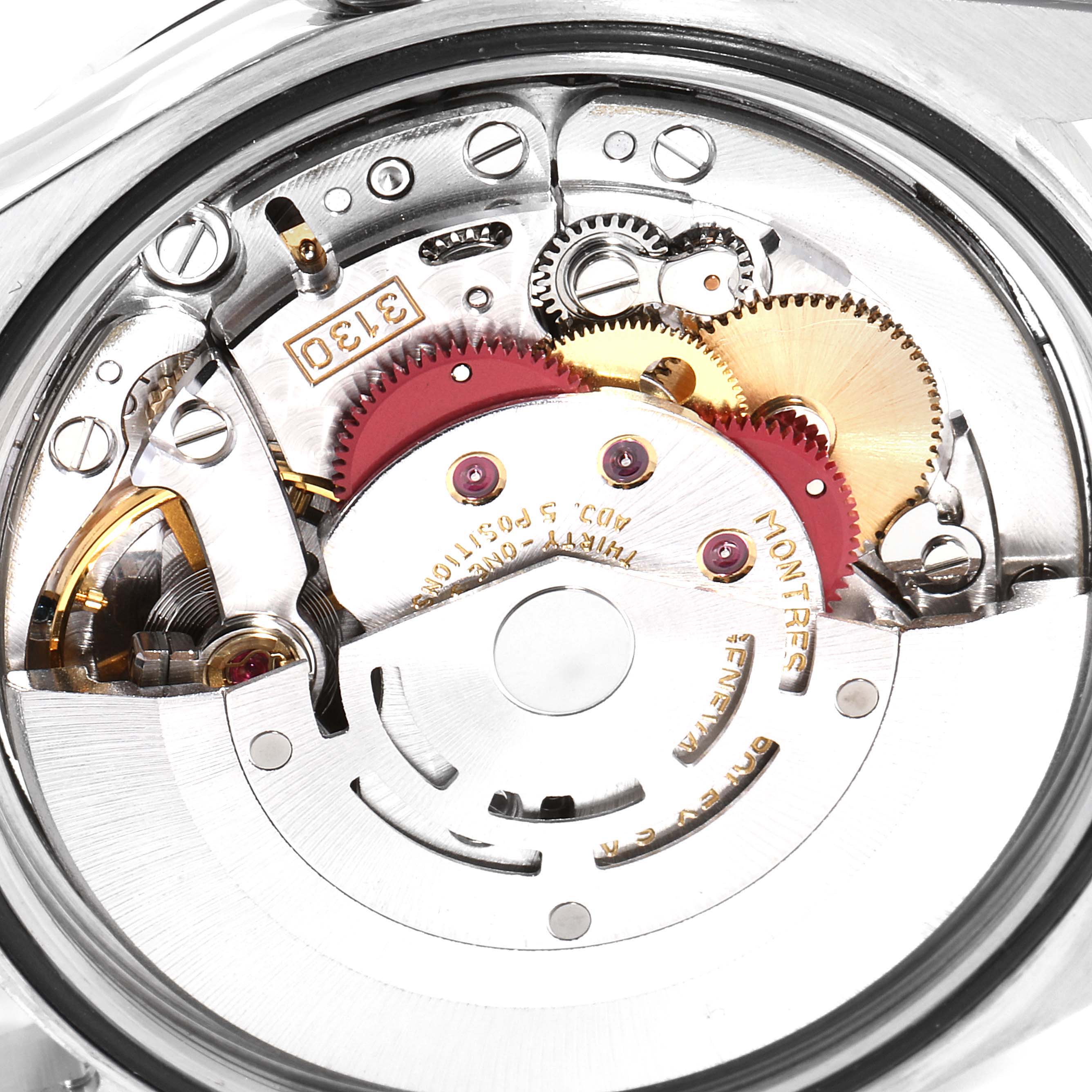 This image shows an angled close-up of the Rolex Explorer 114270 Men
s Stainless Steel Black Dial 114270 Men
s Stainless Steel Black Dial model
s internal movement mechanism, highlighting gears and components.