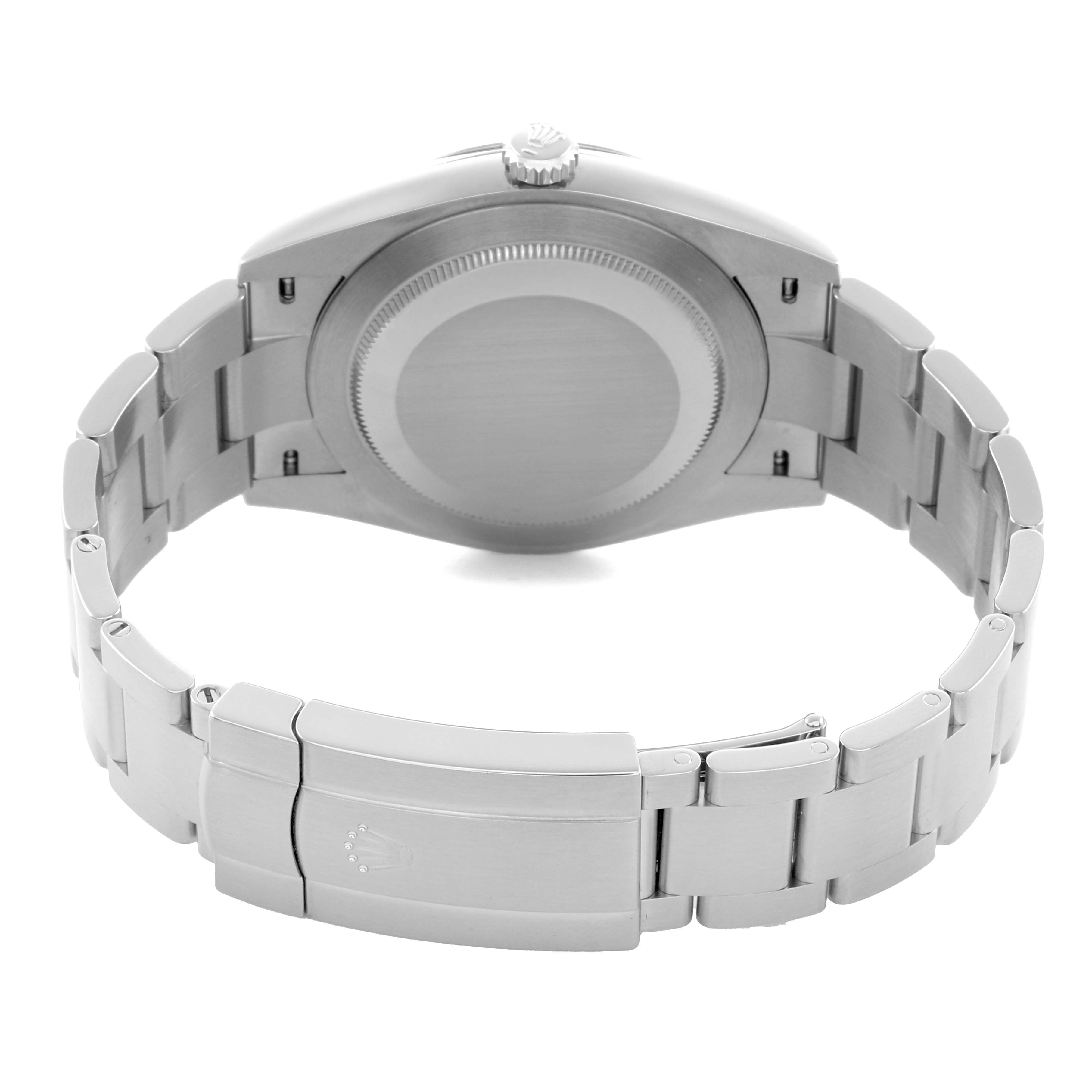 The Rolex Oyster Perpetual 124300 Men
s Stainless Steel Blue Dial watch is shown from the back, highlighting its case back and bracelet clasp.