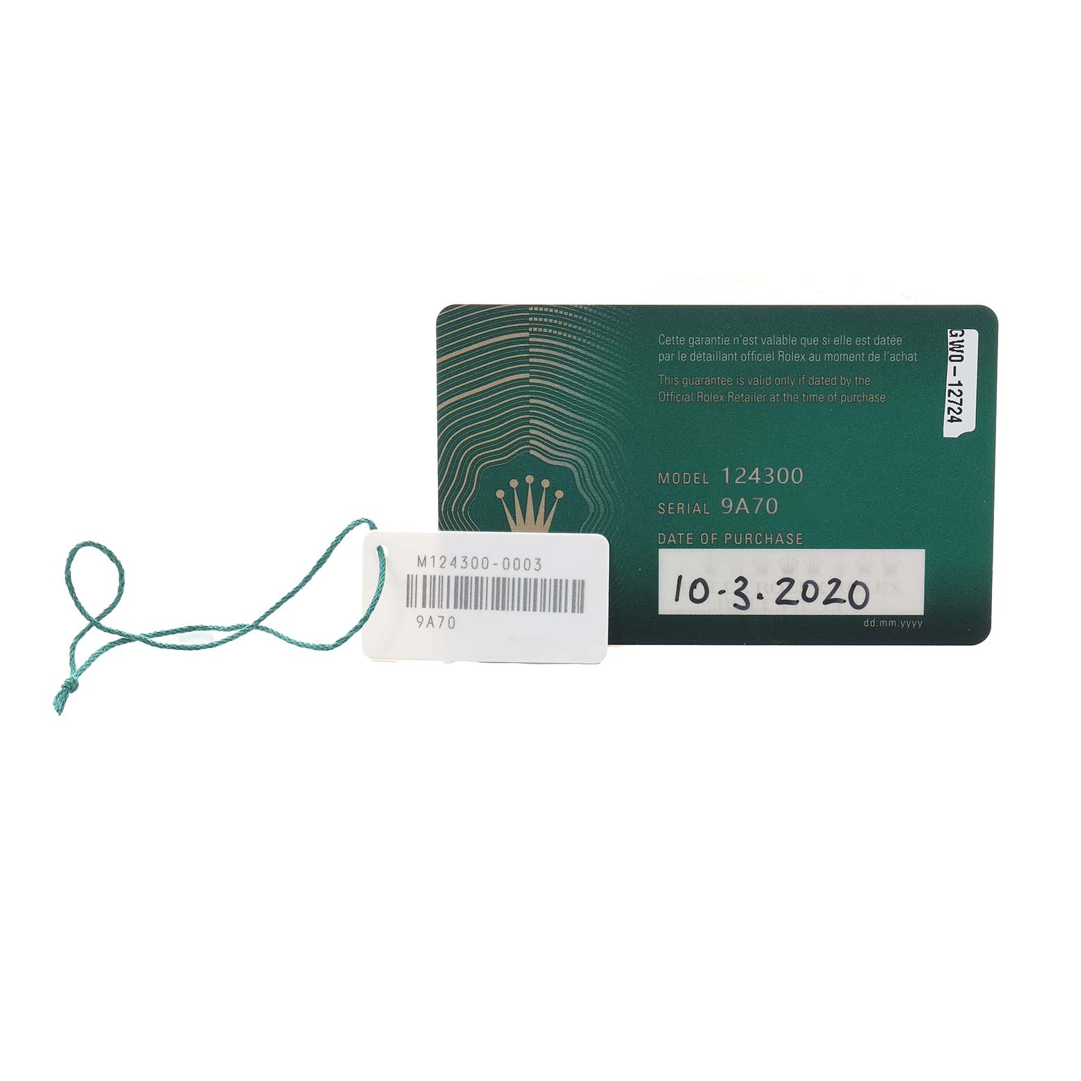 The image shows a warranty card and a tag for the Rolex Oyster Perpetual 124300 Men
s Stainless Steel Blue Dial model 124300 with serial number 9A70.