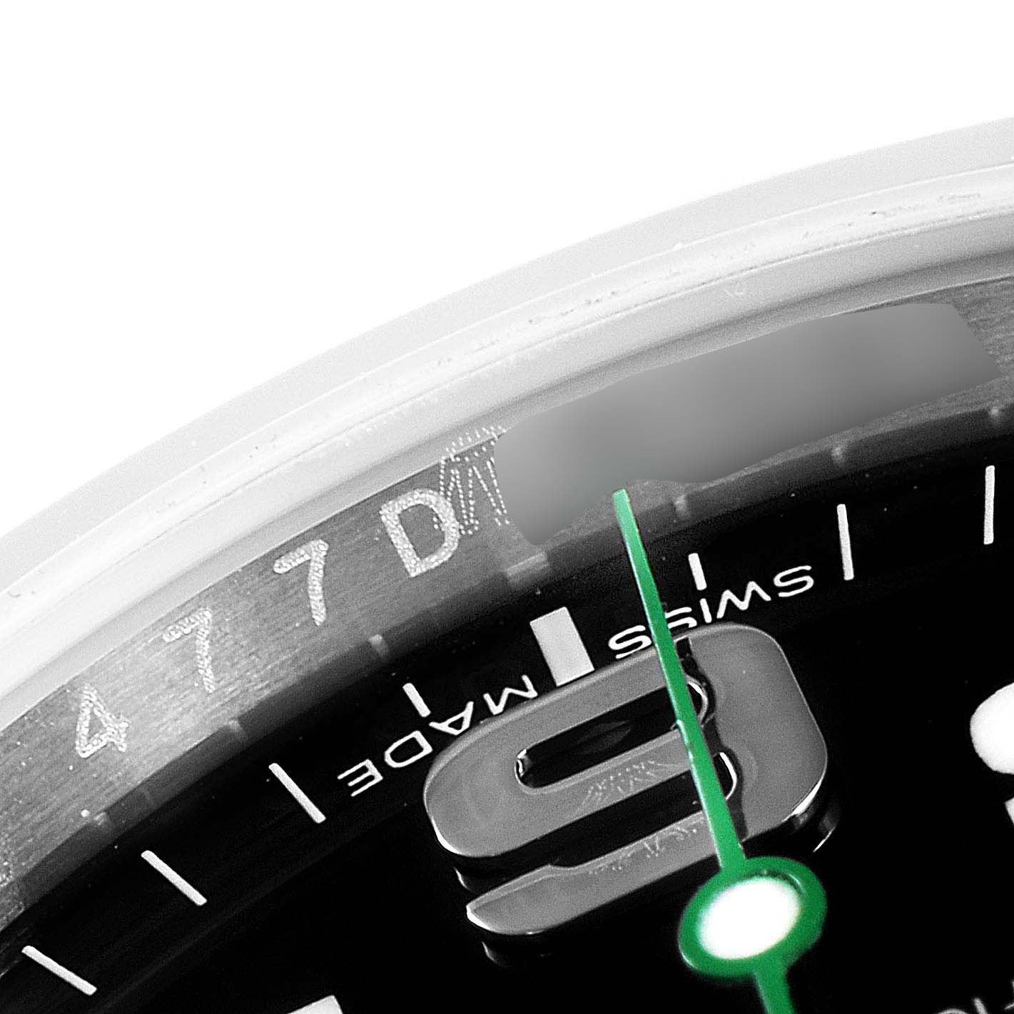 This close-up angle of the Rolex Air-King 116900 Men's Stainless Steel Black Dial 116900 Men's Stainless Steel Black Dial watch shows the dial with "Swiss Made" text and part of the watch hands.