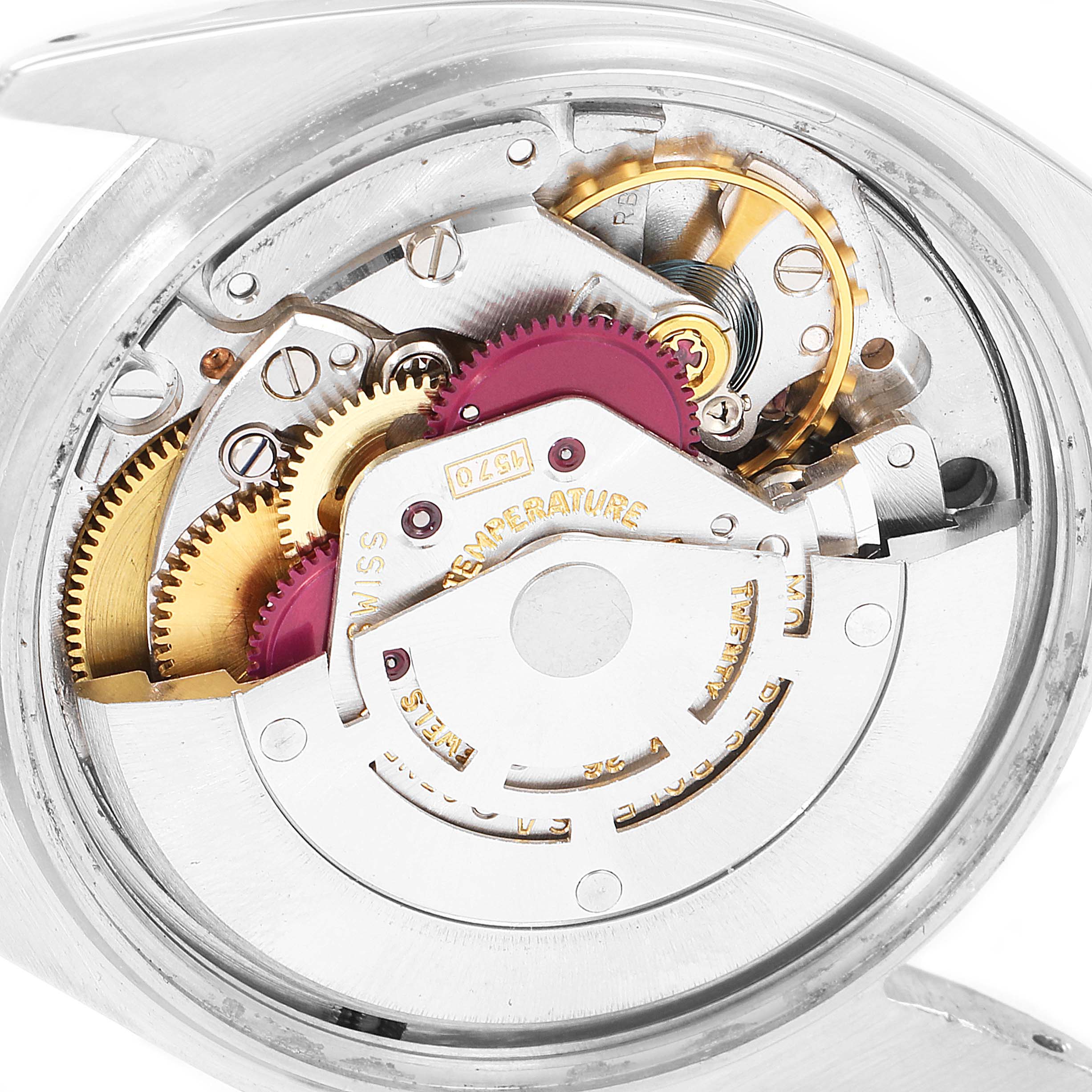 The image shows a close-up of the internal mechanism of a Rolex Vintage Collection 1018 Men's Stainless Steel Silver Dial 1018 Men's Stainless Steel Silver Dial watch.