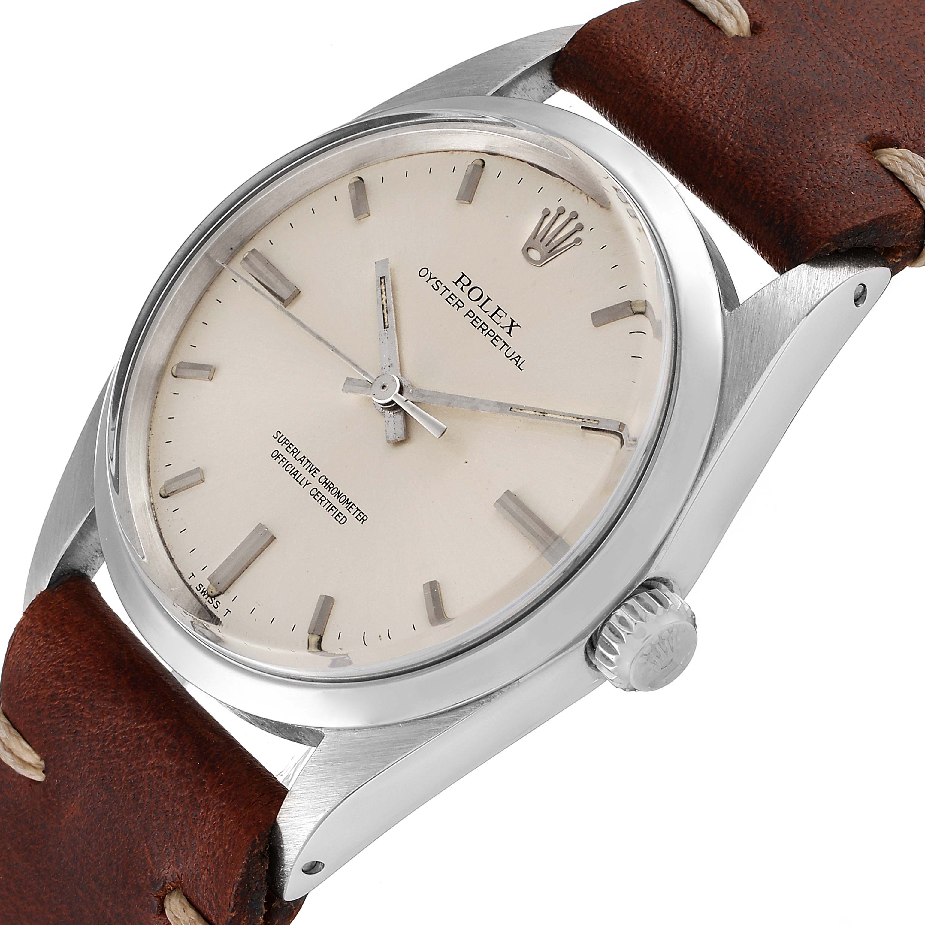 The Rolex Vintage Collection 1018 Men's Stainless Steel Silver Dial 1018 Men's Stainless Steel Silver Dial watch is shown at a slight angle, highlighting its face, crown, and leather strap.