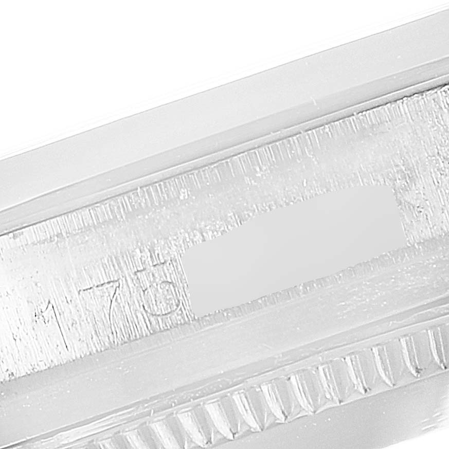 The close-up image shows the side of the case and part of the bezel of a Vintage Collection Rolex watch.