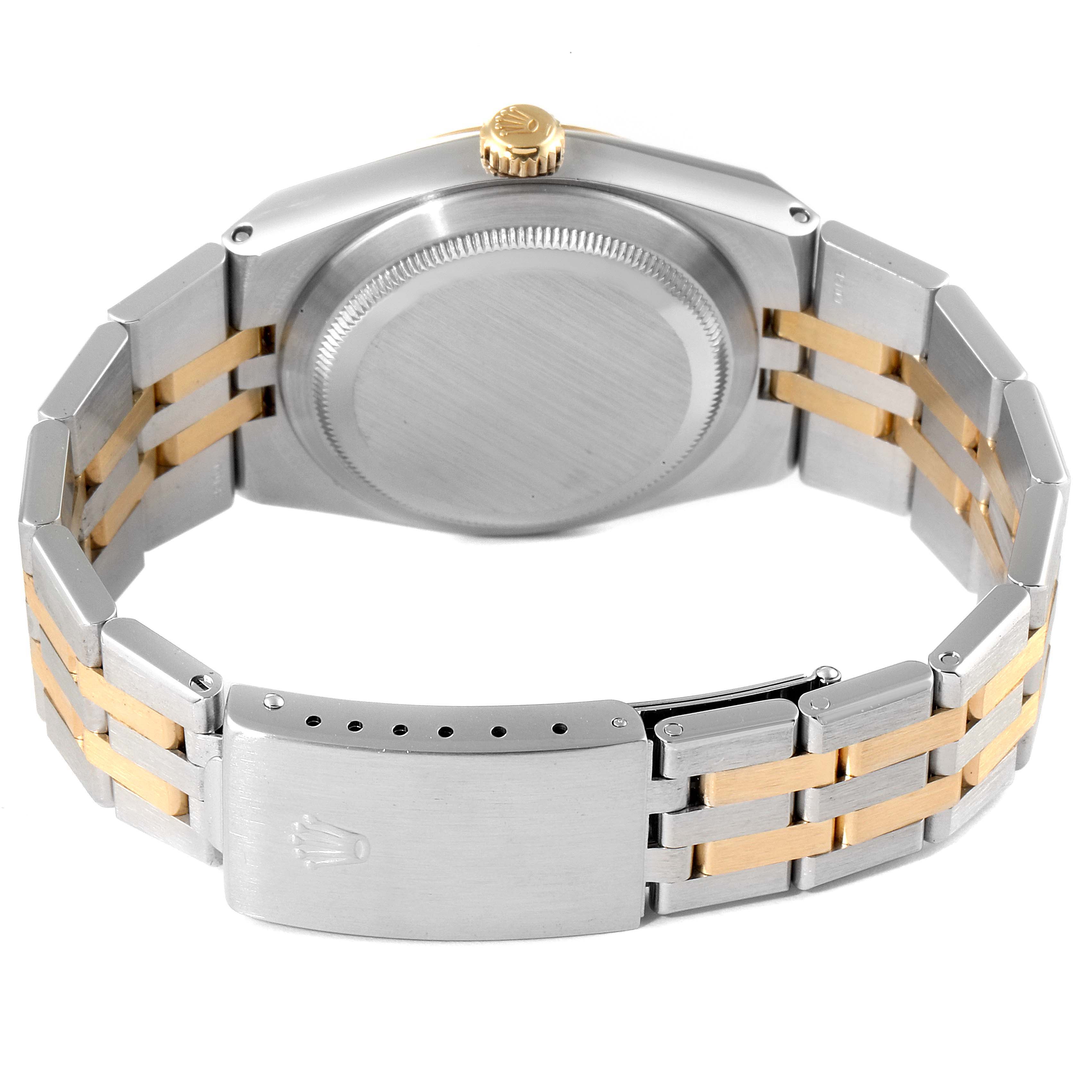 This image shows the back case, bracelet, clasp, and crown of a Rolex Oysterquartz 17013 Men's Steel and Gold (two tone) Champagne Dial 17013 Men's Steel and Gold (two tone) Champagne Dial watch from a rear angle.