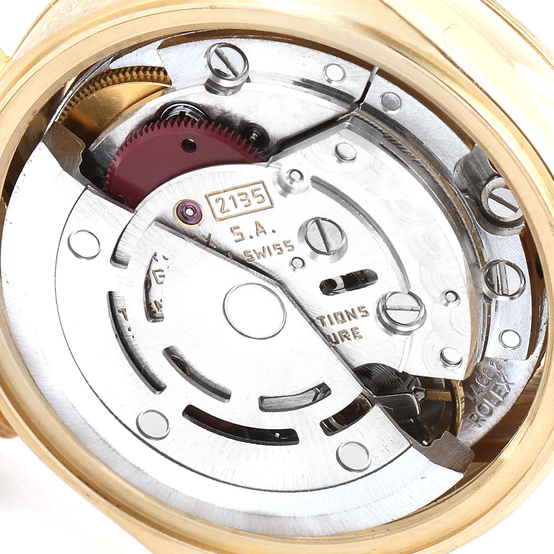 This image shows a close-up view of the Rolex President 69178 Women's Yellow Gold Champagne Dial 69178 Women's Yellow Gold Champagne Dial model watch's internal movement and caliber parts.