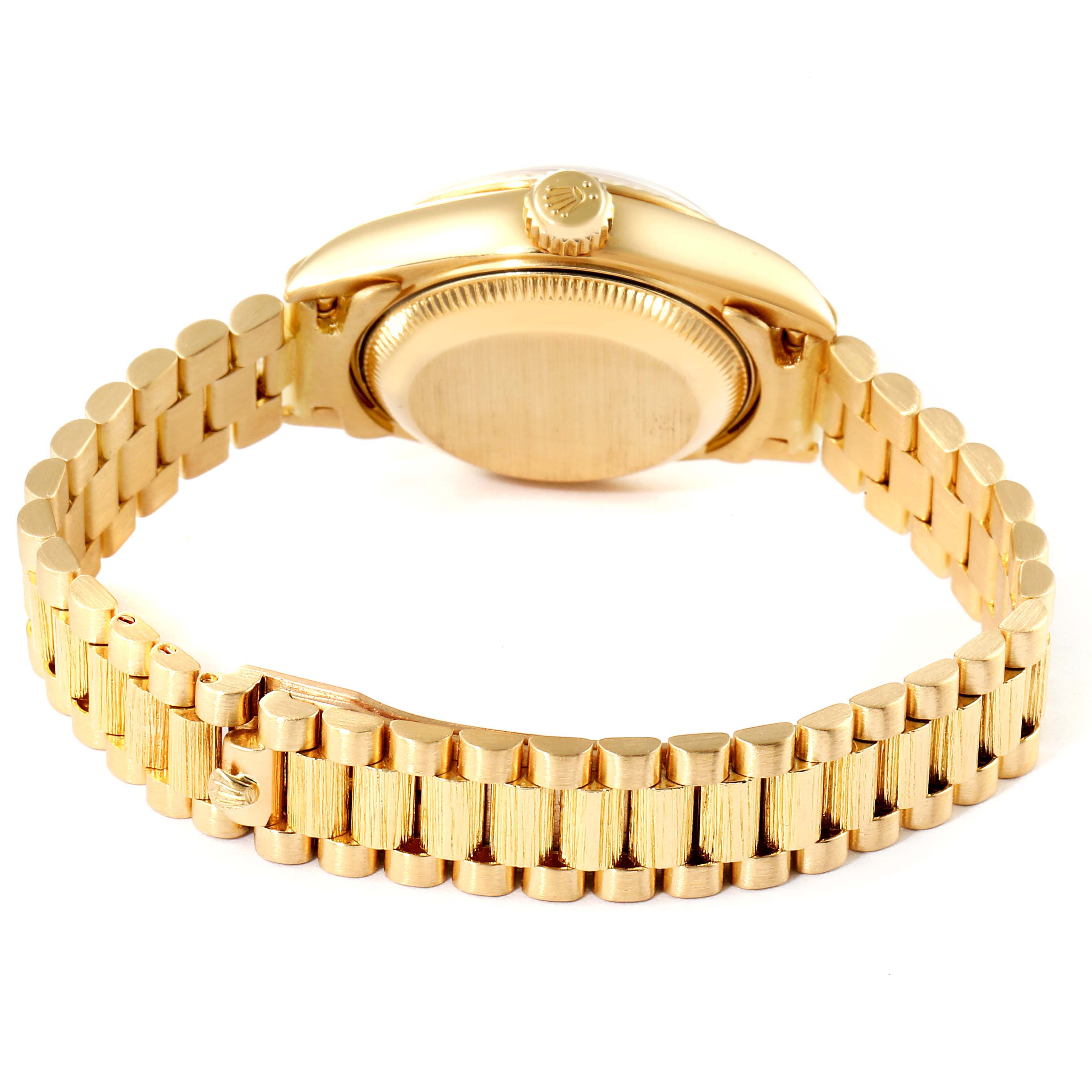 The image shows the back case and gold bracelet of a Rolex President 69178 Women's Yellow Gold Champagne Dial 69178 Women's Yellow Gold Champagne Dial model watch.