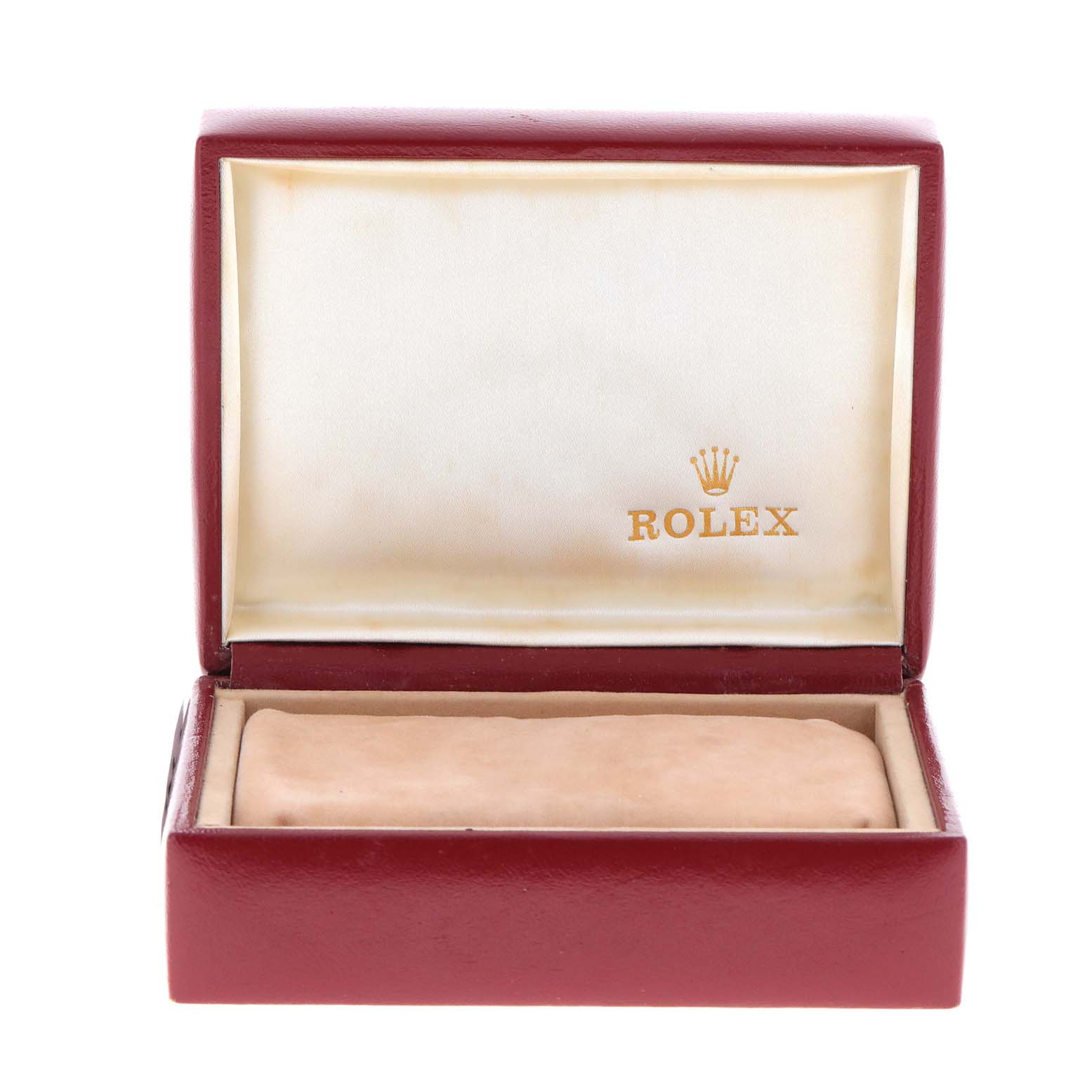 The image shows a red Rolex watch box for a President model, with the lid open revealing the Rolex logo inside.