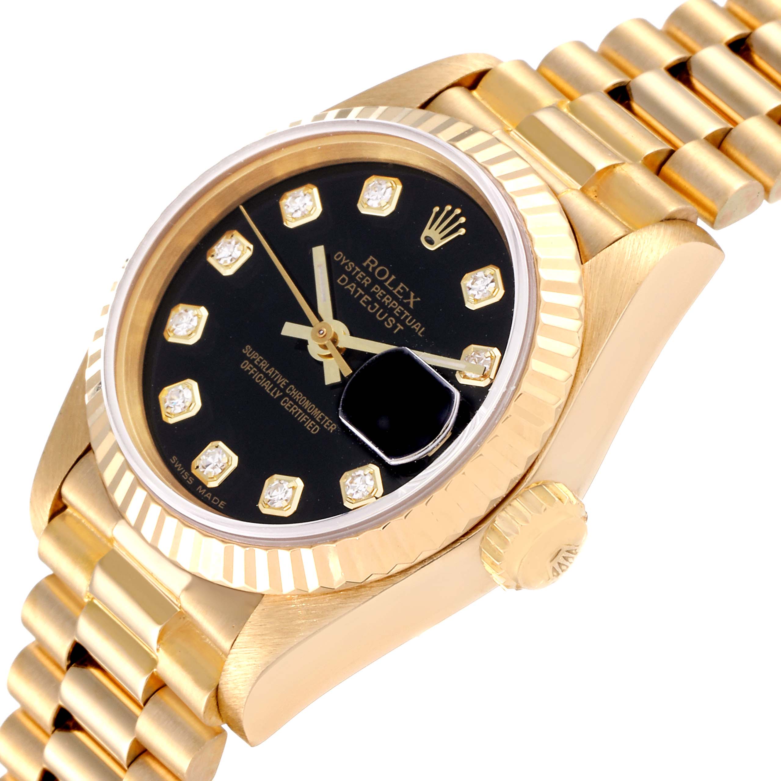 The angle shows a close-up view of the Rolex President 69178 Women's Yellow Gold Black Dial 69178 Women's Yellow Gold Black Dial's face, fluted bezel, part of the bracelet, and the winding crown.