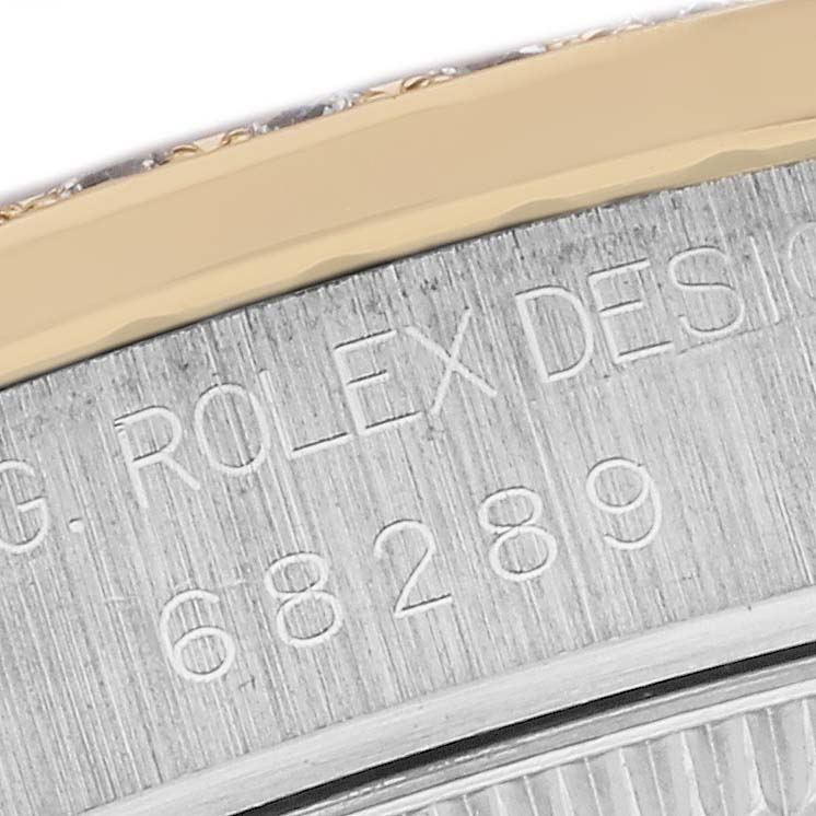 This close-up image shows the engraved case back of a Rolex President 68289 Women's White Gold Silver Dial 68289 Women's White Gold Silver Dial model, highlighting the serial and design numbers.