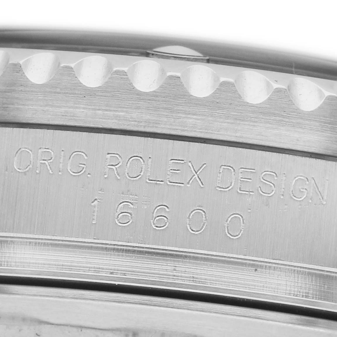 The image shows a close-up of the Rolex Sea-Dweller 16600 Men's Stainless Steel Black Dial model 16600, focusing on the side engraving.