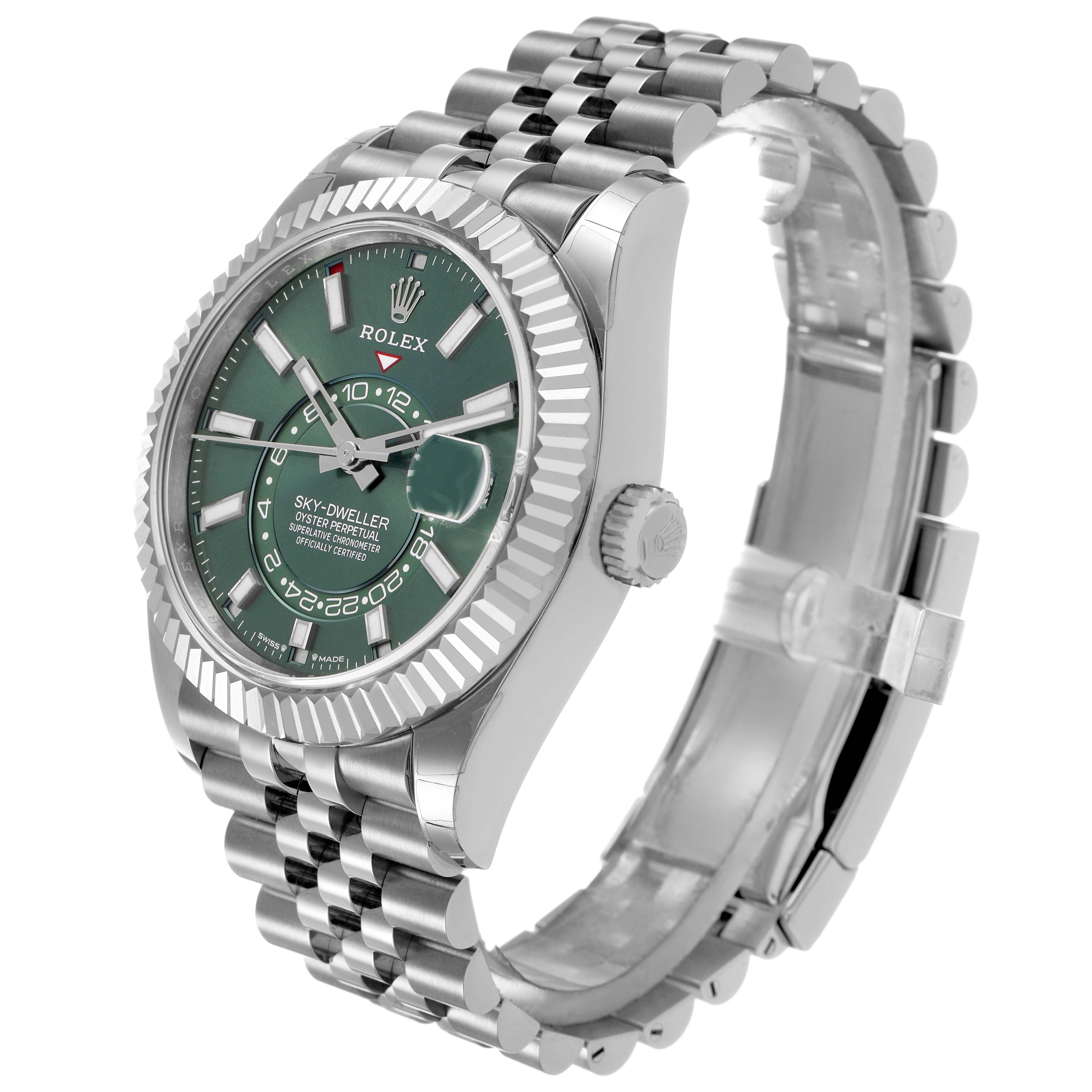 The Rolex Sky-Dweller 336934 Men's Stainless Steel Green Dial is shown at a three-quarter angle, highlighting the green dial, fluted bezel, and jubilee bracelet.