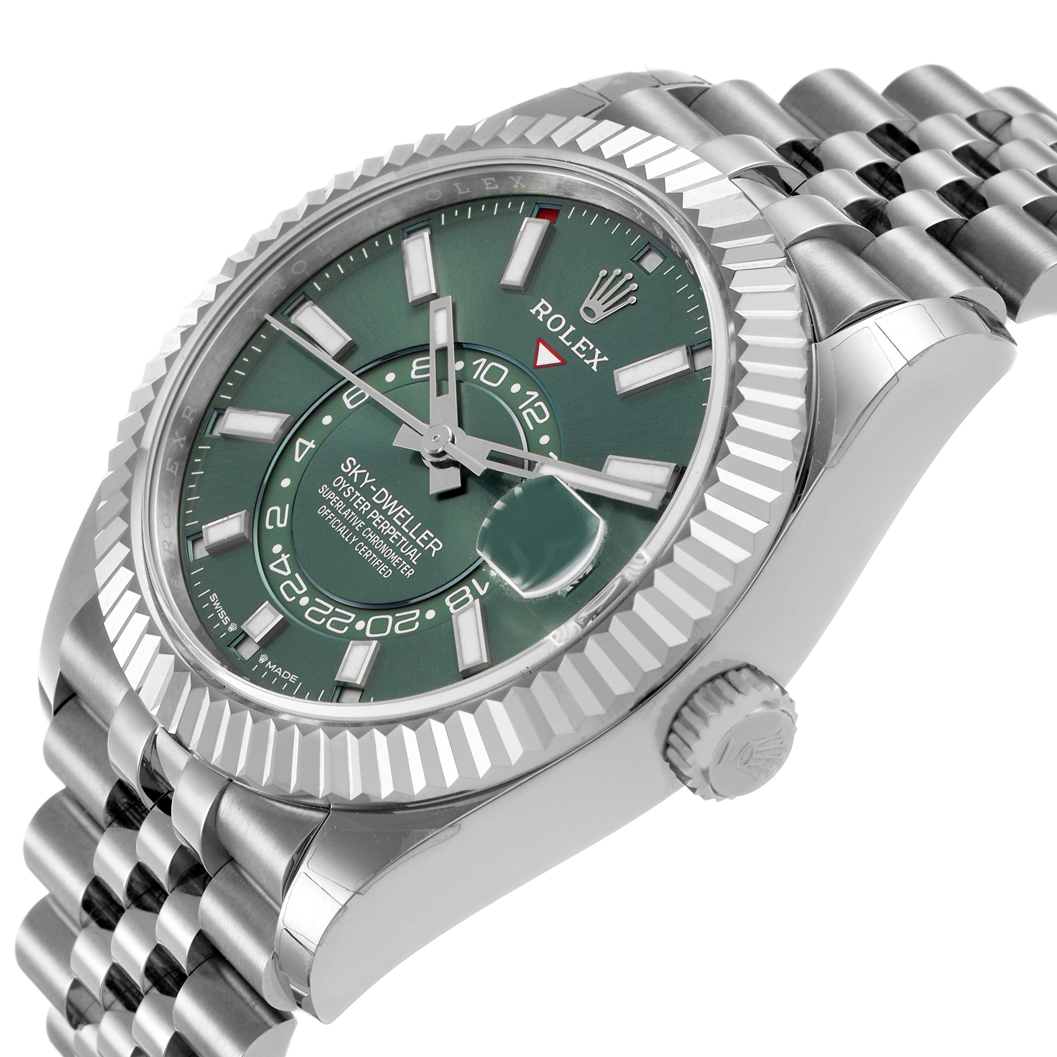 The Rolex Sky-Dweller 336934 Men's Stainless Steel Green Dial watch is shown at a slight angle, highlighting the green dial, fluted bezel, and Jubilee bracelet.