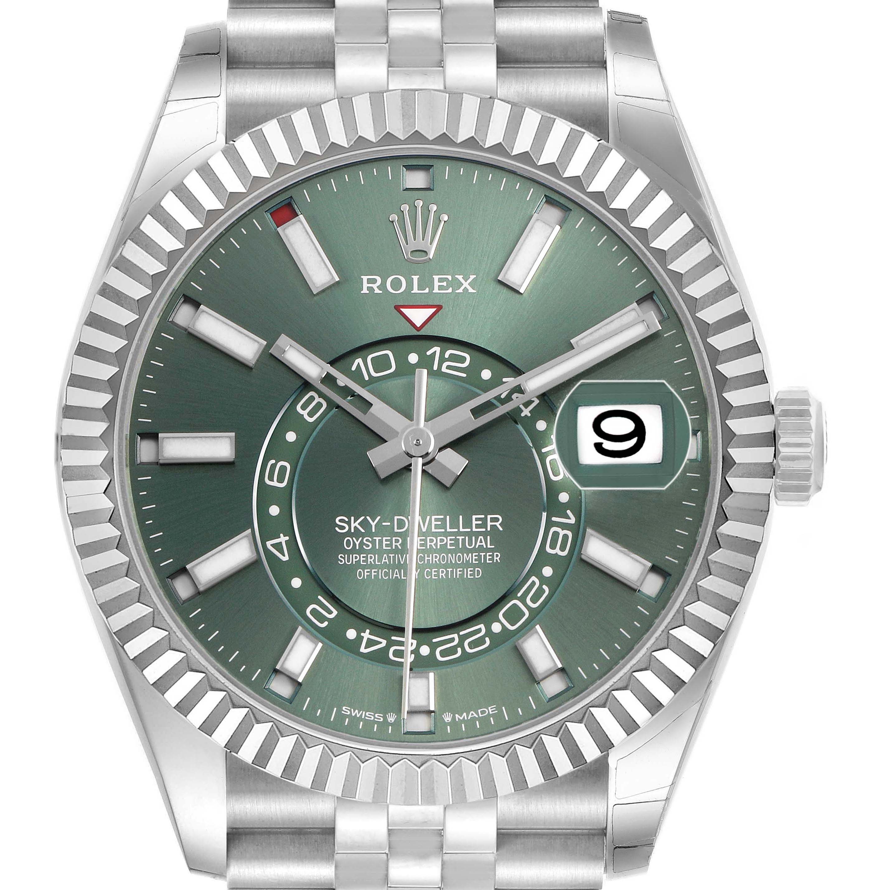The Rolex Sky-Dweller 336934 Men's Stainless Steel Green Dial watch is shown from the front, featuring its green dial, date window, bezel, and partial bracelet.