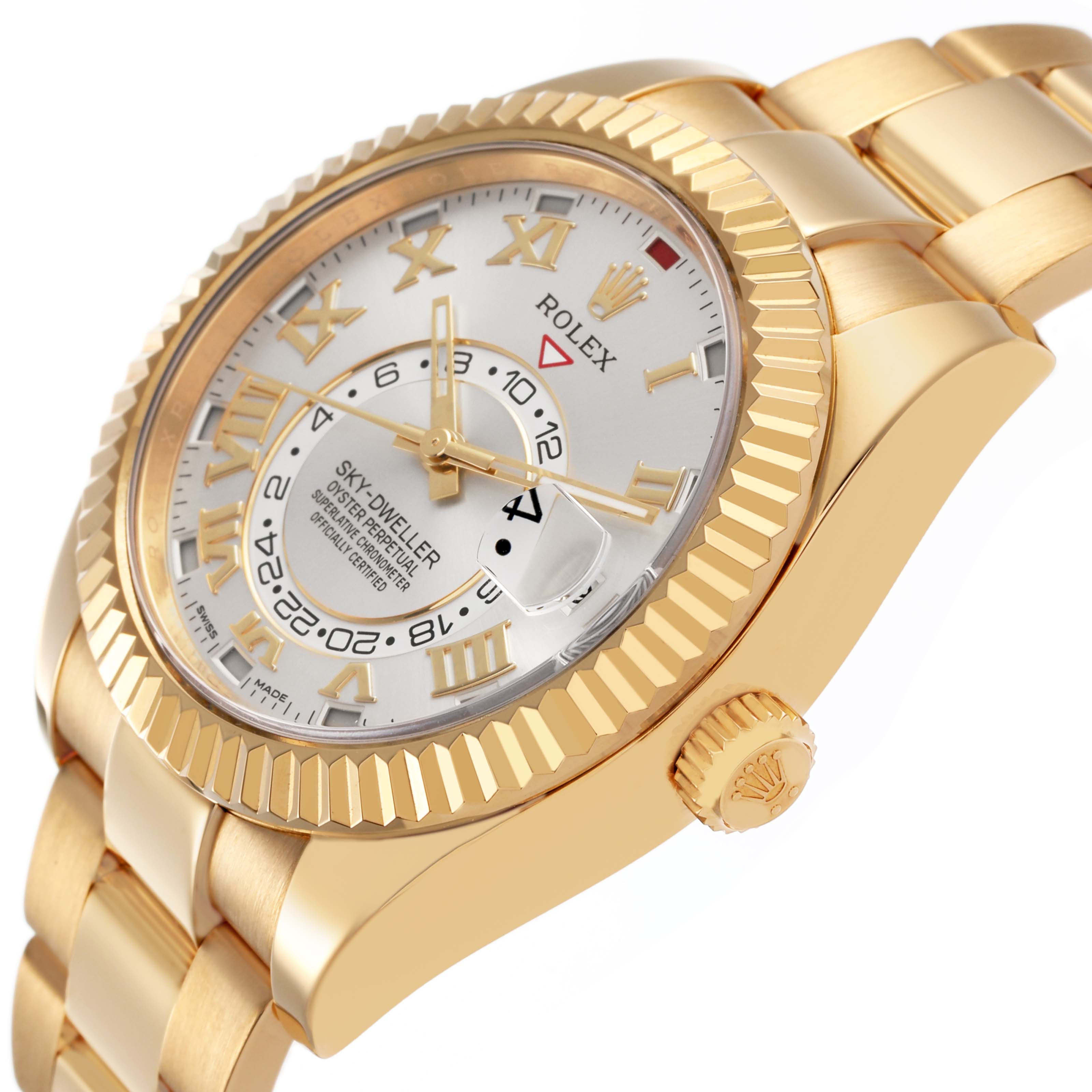 The image shows a Rolex Sky-Dweller 326938 Men's Yellow Gold Silver Dial watch at a slight angle, highlighting its face, bezel, crown, and part of the bracelet.