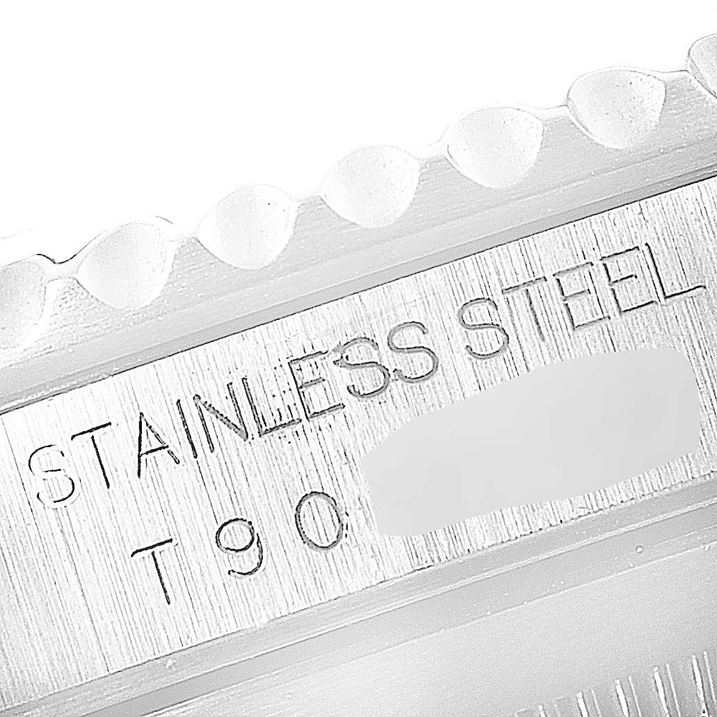 This image shows a close-up view of the stainless steel engraving on the case back of a Rolex Submariner 14060 Men
s Stainless Steel Black Dial 14060 Men
s Stainless Steel Black Dial watch.