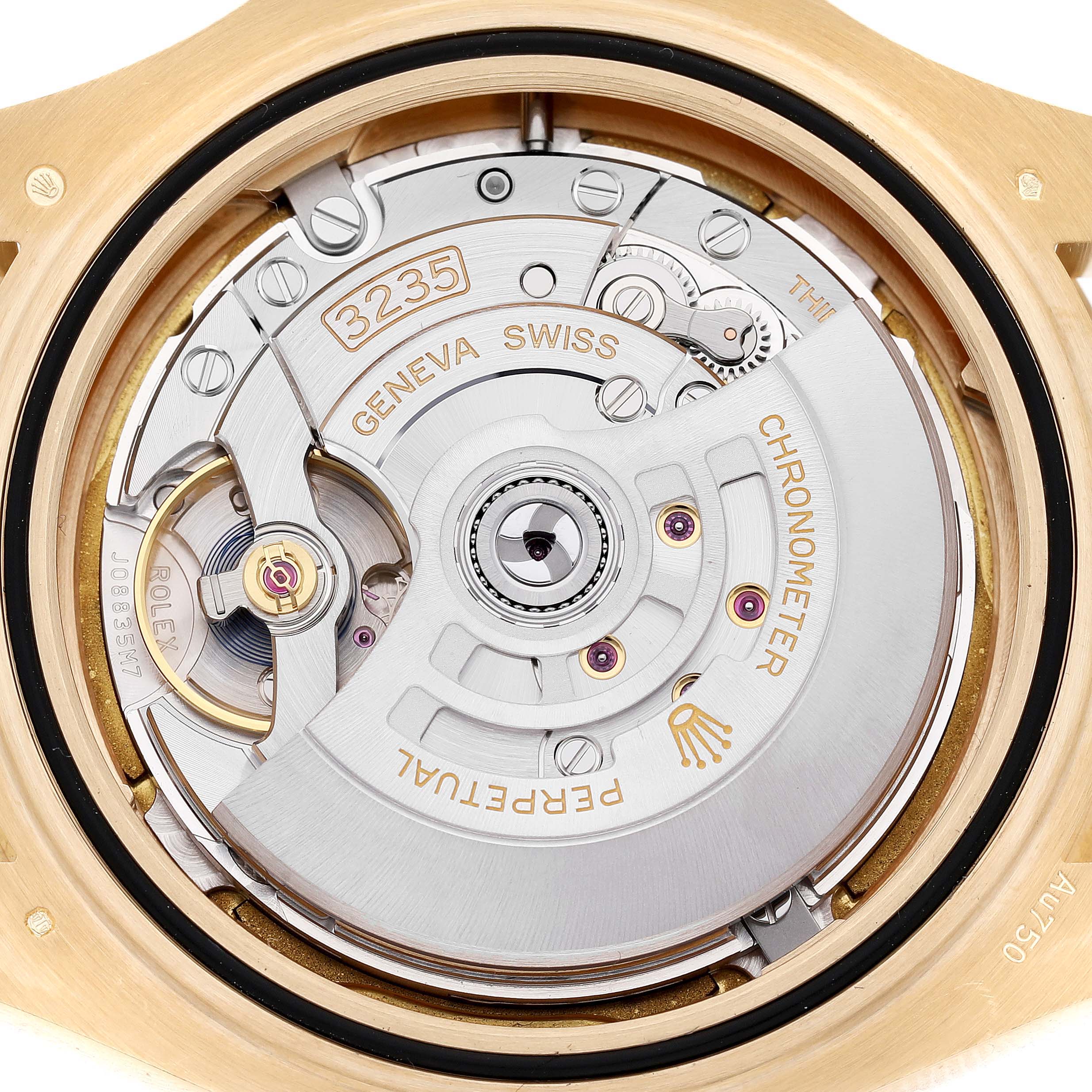 The image shows the movement of the Rolex Yacht-Master 226658 Men's Yellow Gold Black Dial, focusing on the intricate mechanics and the "3235" caliber.
