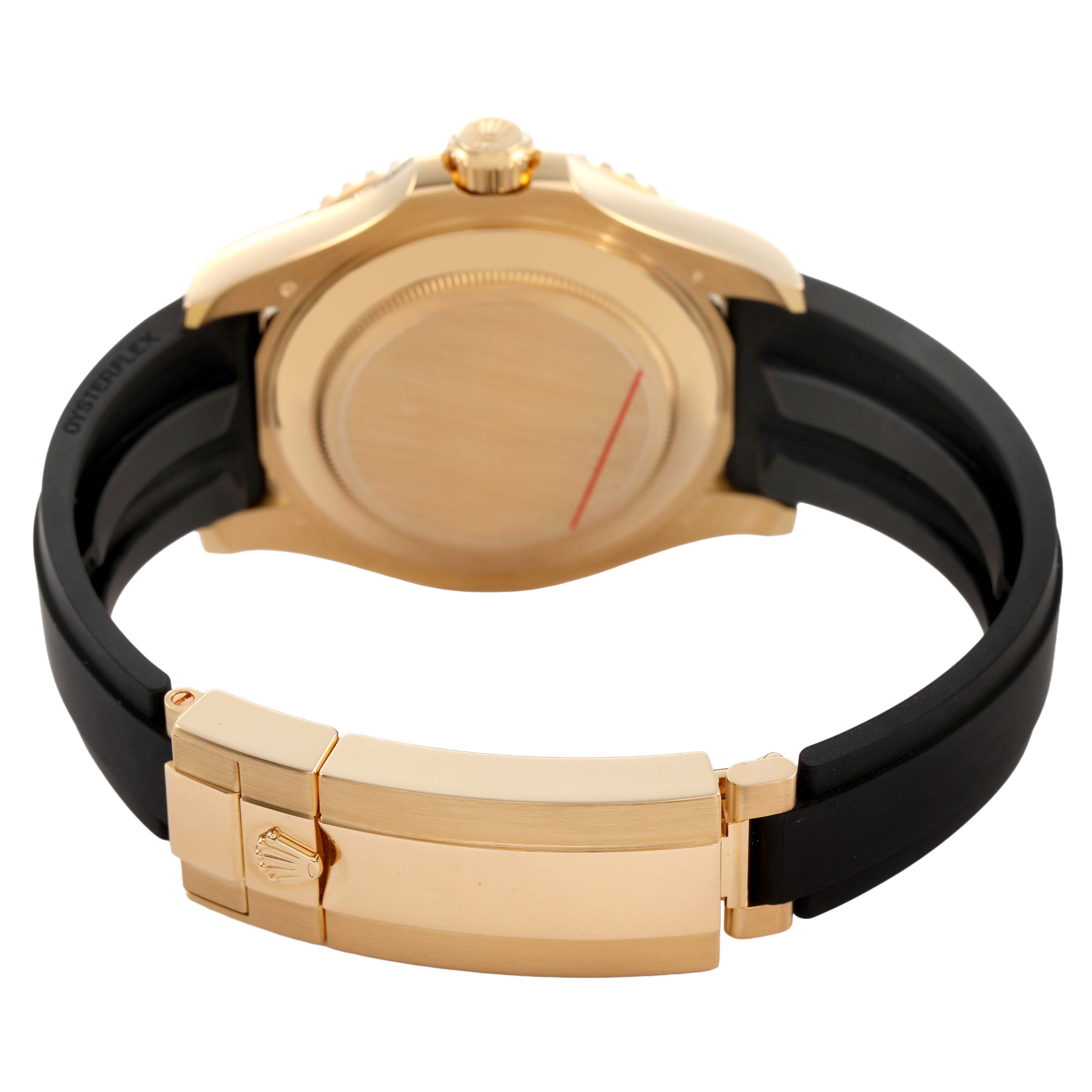 The Rolex Yacht-Master 226658 Men's Yellow Gold Black Dial watch is shown from the back, highlighting the gold case and clasp with a black strap.