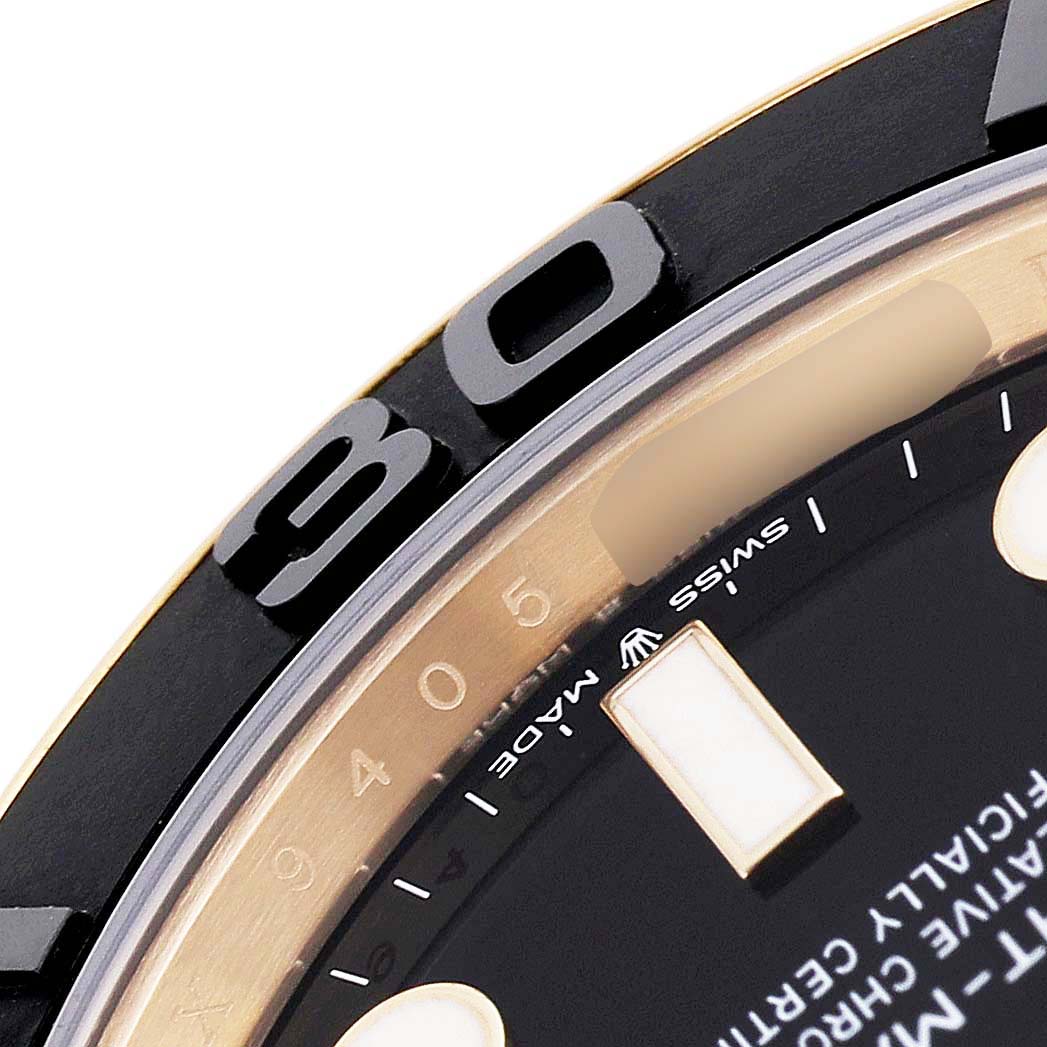 The image shows a close-up of the bezel and dial edge of a Rolex Yacht-Master 226658 Men's Yellow Gold Black Dial watch, focusing on the numbers and markers.
