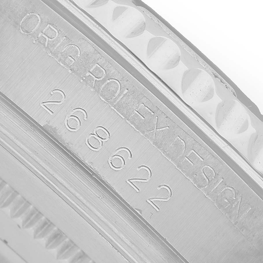 The image shows a close-up of the Rolex Yacht-Master 268622 Men's Stainless Steel Silver Dial watch's engraved case side with model details.