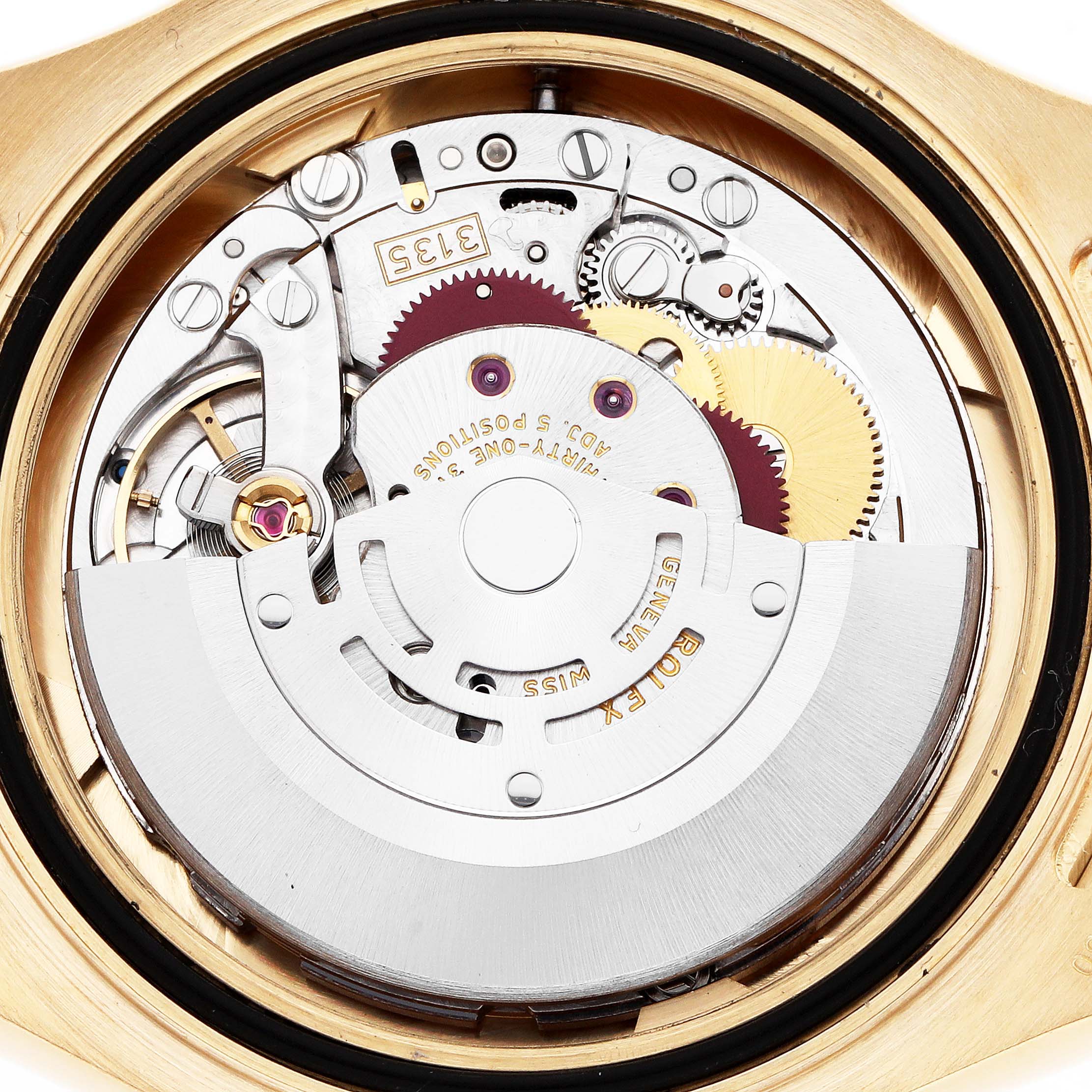 The image shows the movement of a Rolex Yacht-Master 16628B Men
s Yellow Gold Mother of Pearl Dial watch, featuring gears and inscriptions, viewed from the back.