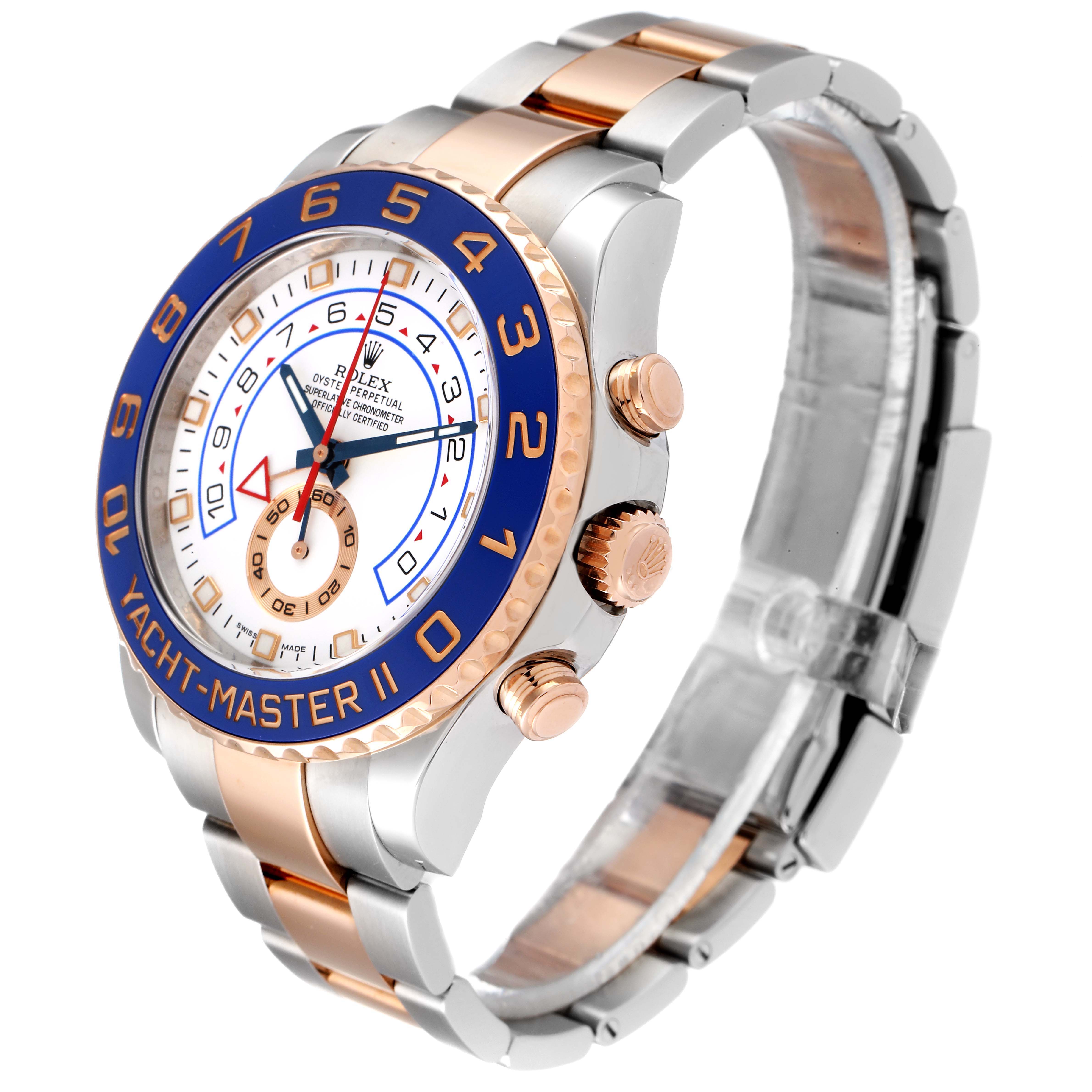 The image shows a side angle of a Rolex Yacht-Master 116681 Men's Steel and Gold (two tone) White Dial 116681 Men's Steel and Gold (two tone) White Dial II watch displaying the face, bezel, case, crown, and part of the bracelet.