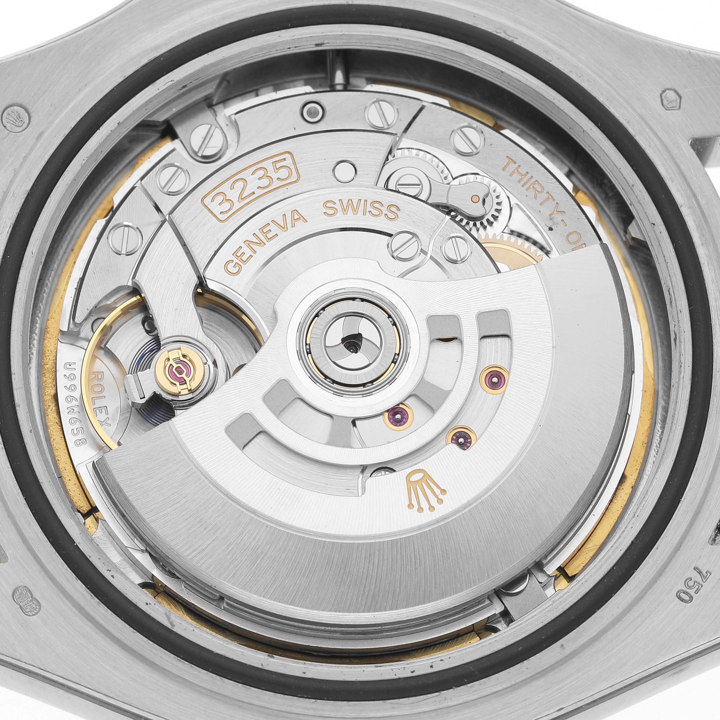The image shows the movement of a Rolex Yacht-Master 226659 Men's White Gold Black Dial watch from a rear view, highlighting the intricate internal mechanism.