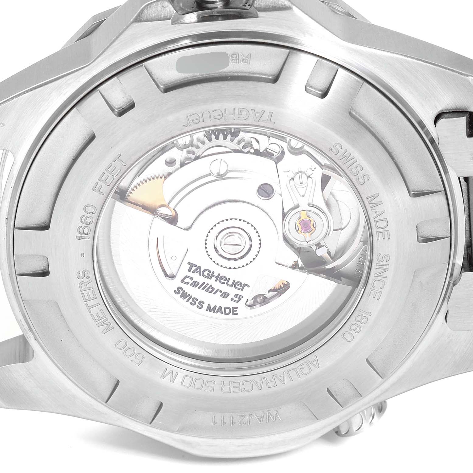 The image shows the rear view of a Tag Heuer Aquaracer WAJ2111.BA0870 Men's Stainless Steel Grey Dial WAJ2111.BA0870 Men's Stainless Steel Grey Dial watch, displaying its internal mechanism and Calibre 5 label.