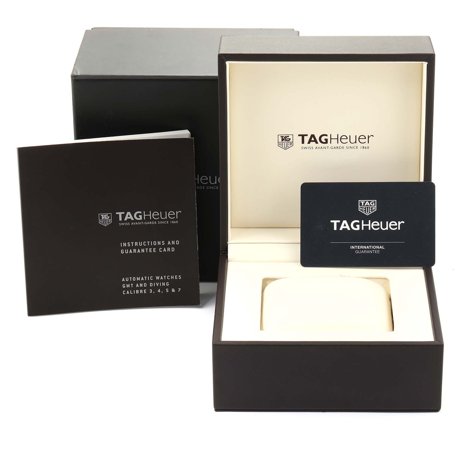 The image shows the packaging, guarantee card, and instruction manual for the Tag Heuer Aquaracer WAJ2111.BA0870 Men's Stainless Steel Grey Dial WAJ2111.BA0870 Men's Stainless Steel Grey Dial watch.