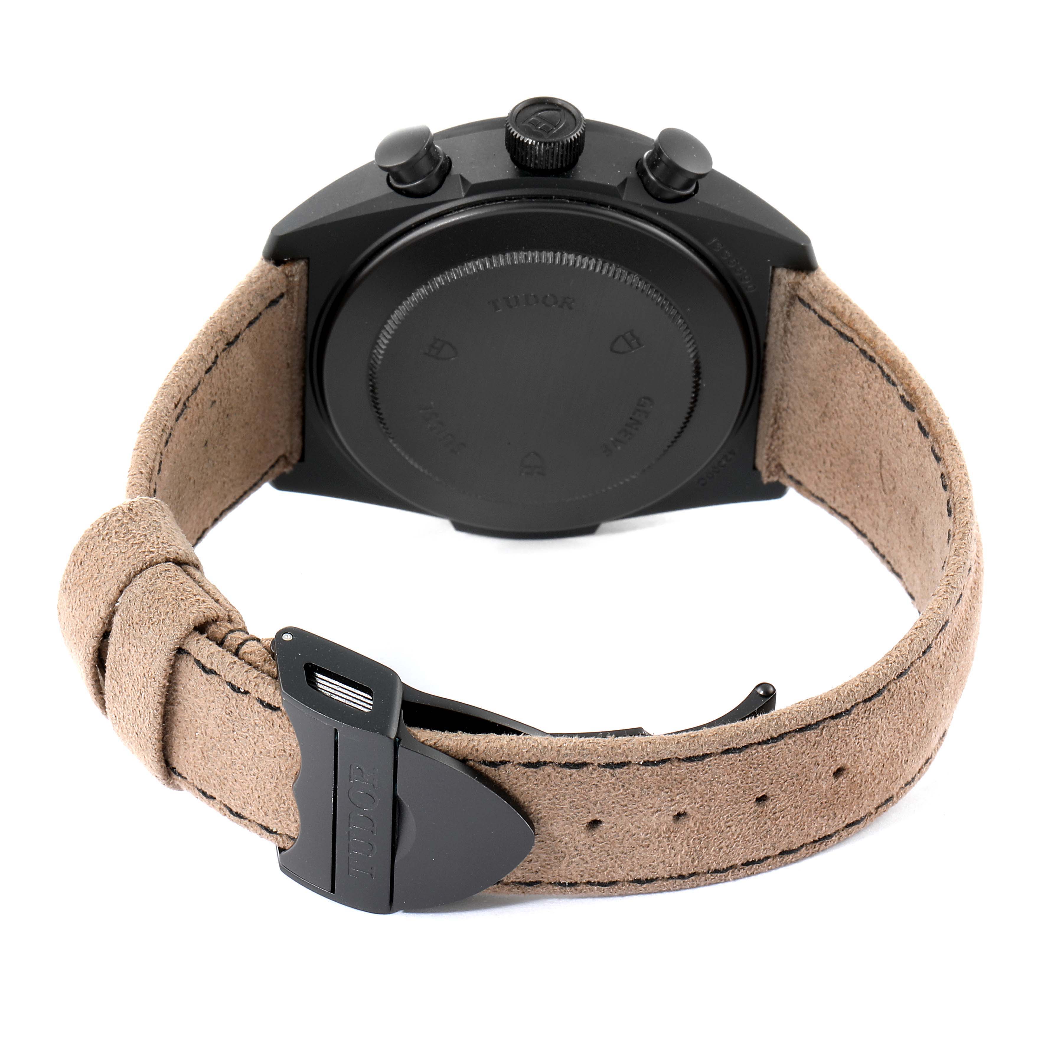 The image shows the back view of a Tudor Fastrider 42000CN Men's Ceramic Black Dial 42000CN Men's Ceramic Black Dial watch, highlighting its case back, strap, and clasp.