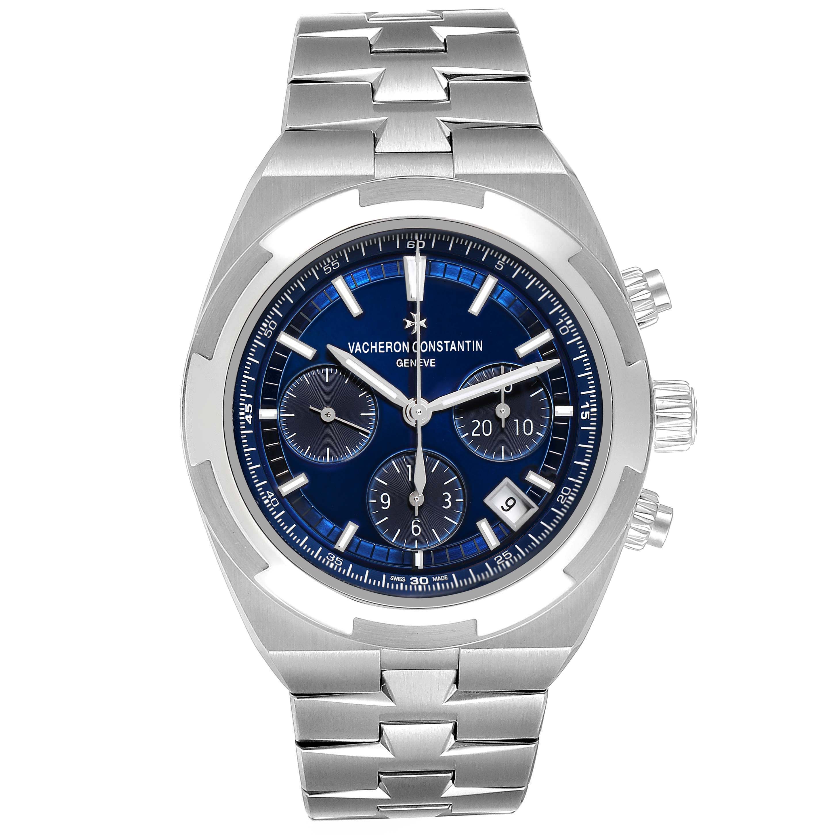 The Vacheron Constantin Overseas 5500V Men
s Stainless Steel Blue Dial watch is shown from a top-down angle, highlighting its blue dial, subdials, and metal bracelet.