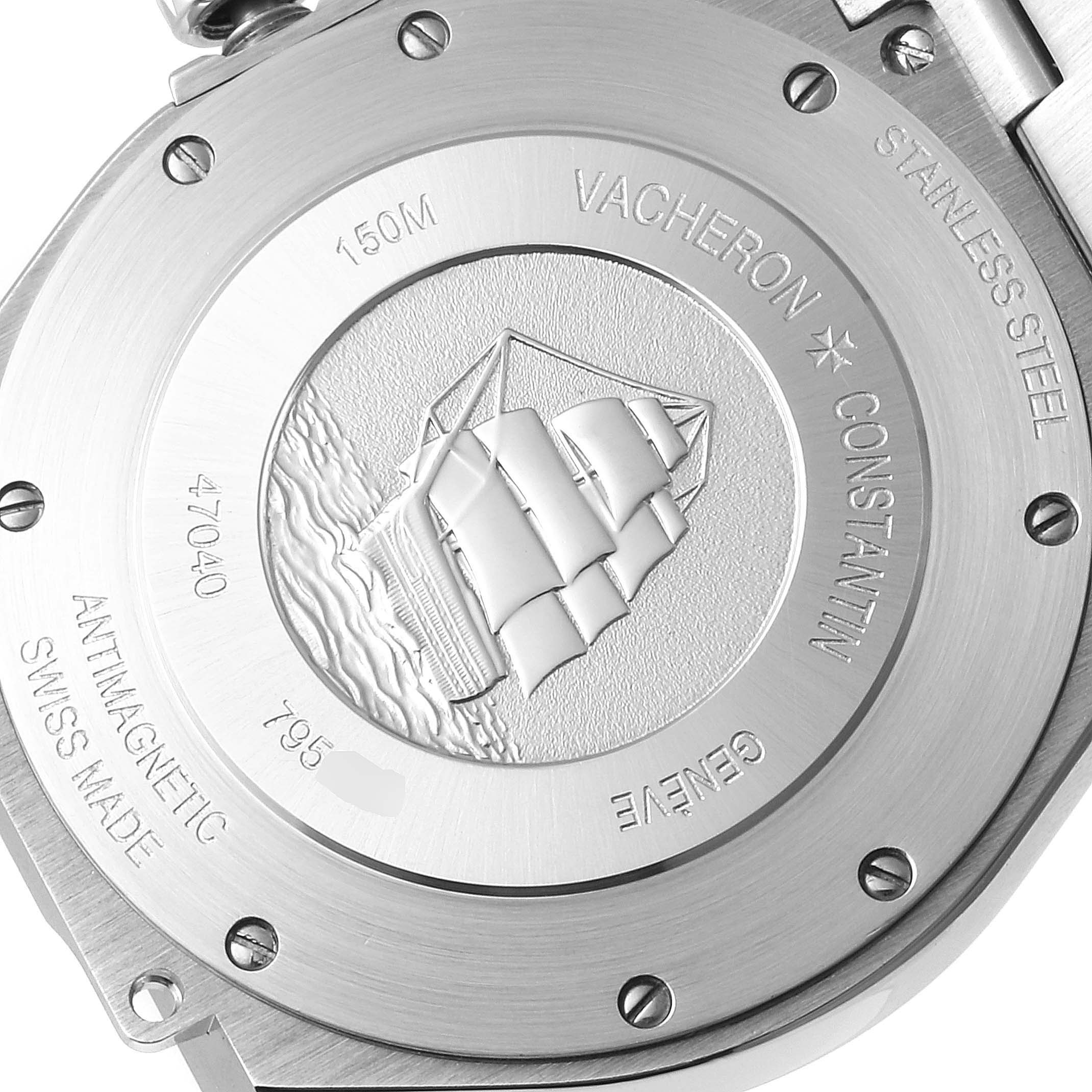 The image shows the case back of the Vacheron Constantin Overseas 47040B01A-9093 Men's Stainless Steel Silver Dial 47040B01A-9093 Men's Stainless Steel Silver Dial watch at a close-up angle, detailing its engravings.